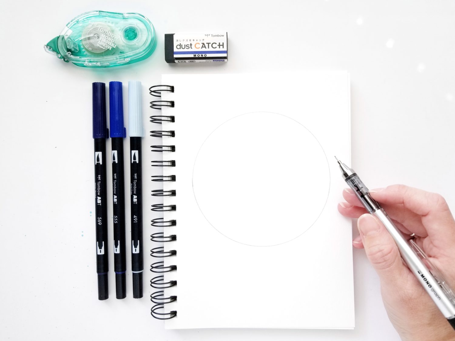 Create easy zodiac watercolor masking art using @tombowusa Dual Brush Pens and MONO Removable Adhesive with @graceannestudio!