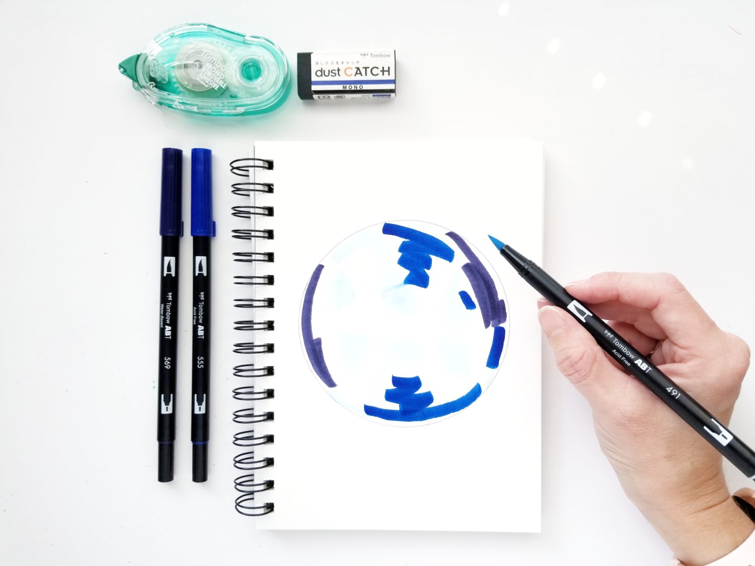 Create easy zodiac watercolor masking art using @tombowusa Dual Brush Pens and MONO Removable Adhesive with @graceannestudio!