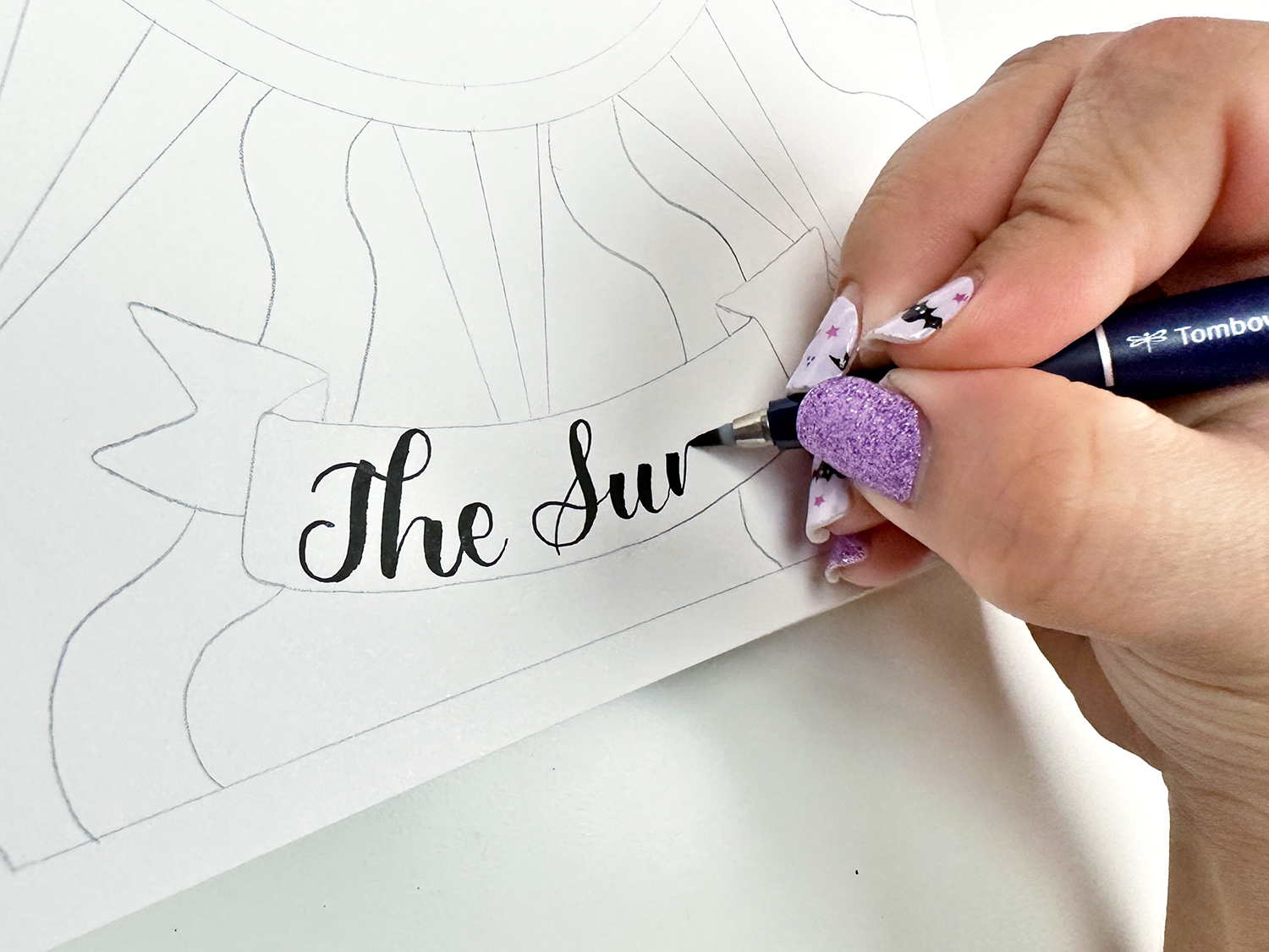 Add lettering using the Tombow Fudenosuke Brush Pen. The hard tip brush pen is really helpful for beginners. #tombow #lettering