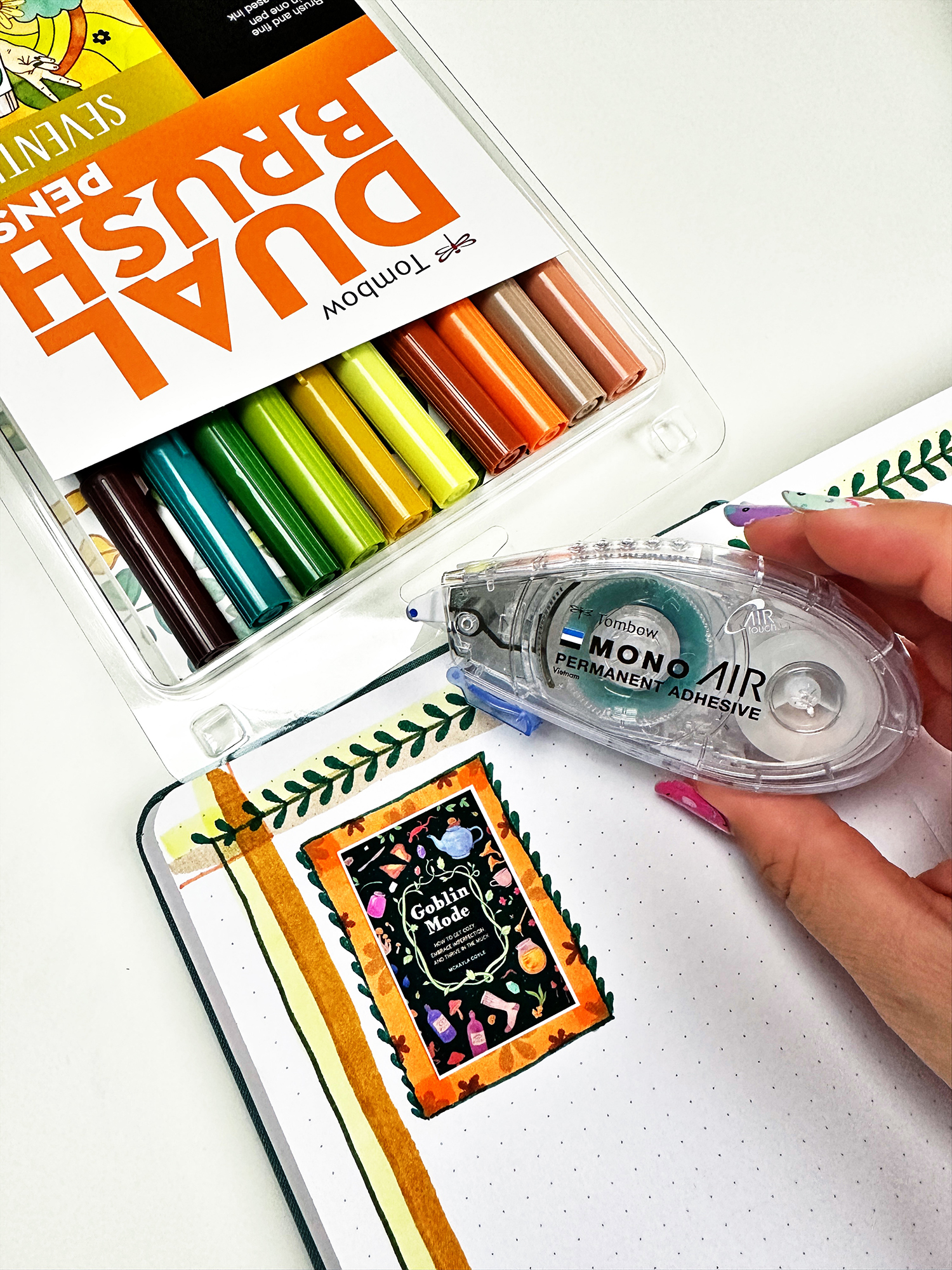 To glue photos and die cuts, use the Tombow MONO Air Touch Adhesive. #tombow #journaling