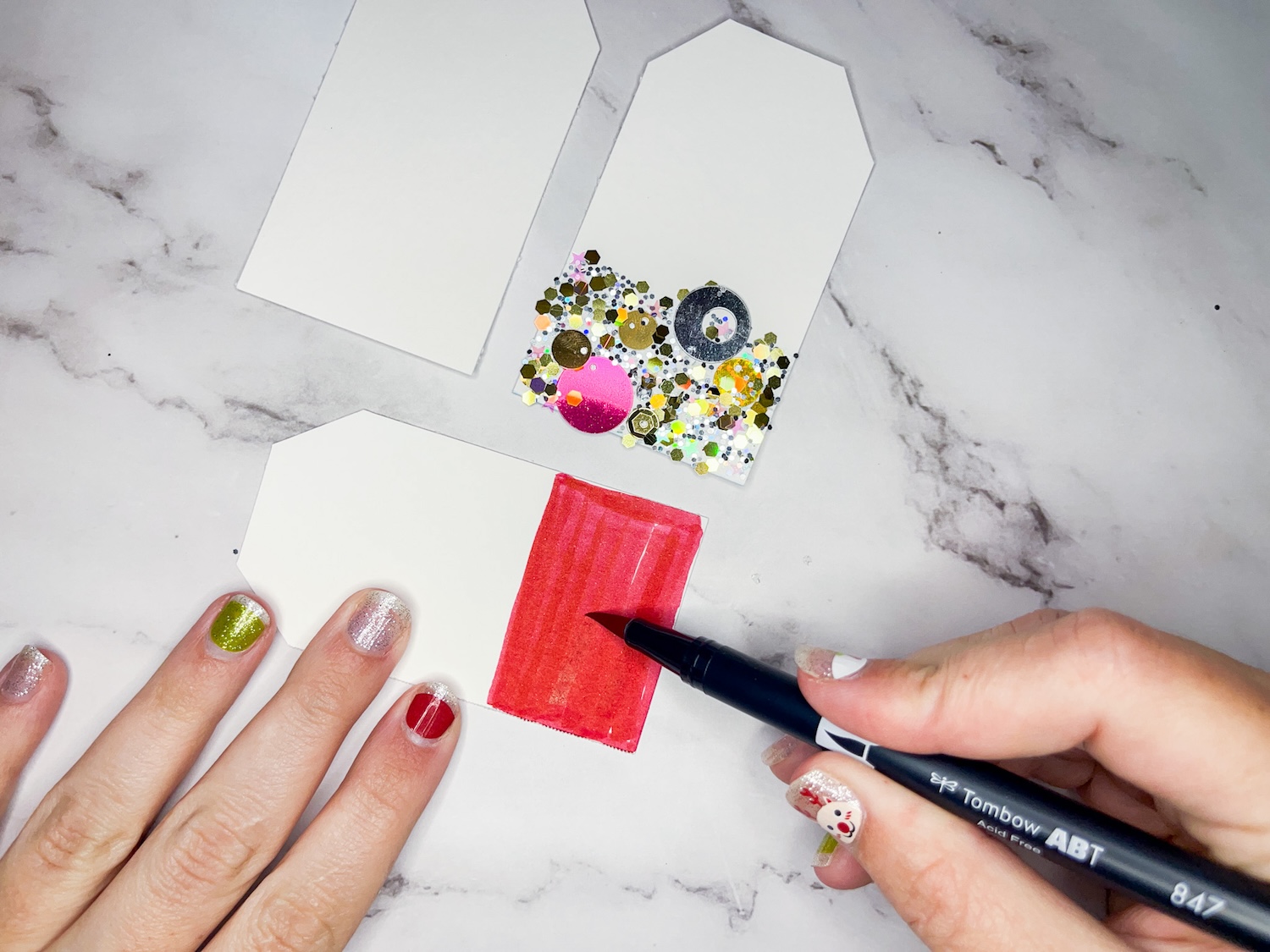 Learn how to make your own DIY Glitter Gift Tags following this tutorial by @studiokatie on the @tombowusa blog!