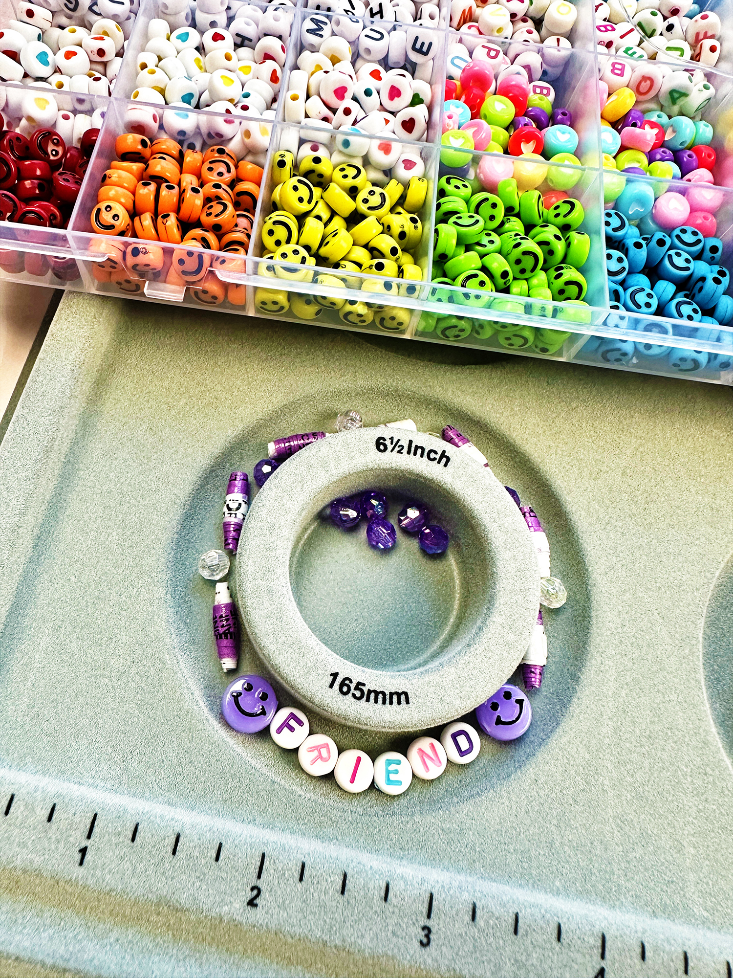 Use recycled paper and Tombow Adhesives to make a bracelet for Galentine's Day! #tombow #diy