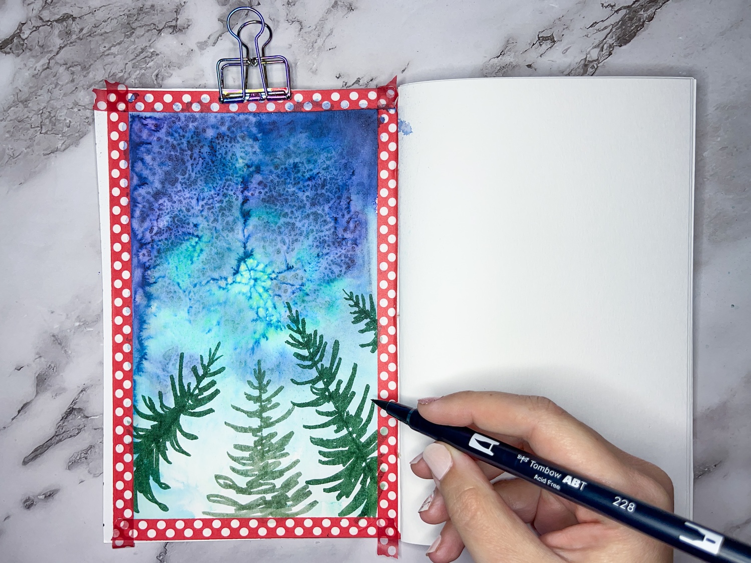 Learn how to Paint a Watercolor Winter Art Journal Page with Dual Brush Pens following this tutorial by @studiokatie on the @tombowusa blog