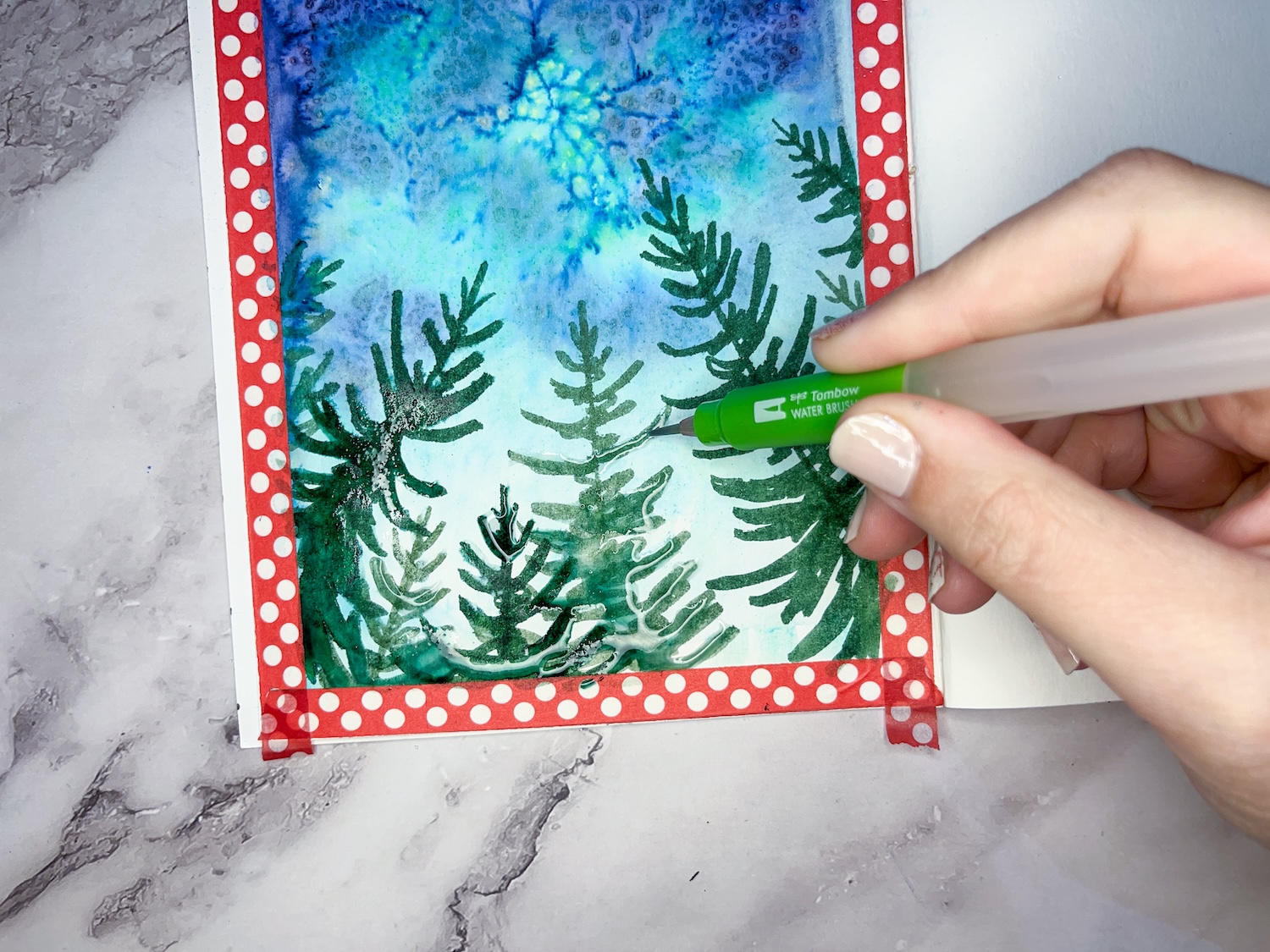 Learn how to Paint a Watercolor Winter Art Journal Page with Dual Brush Pens following this tutorial by @studiokatie on the @tombowusa blog