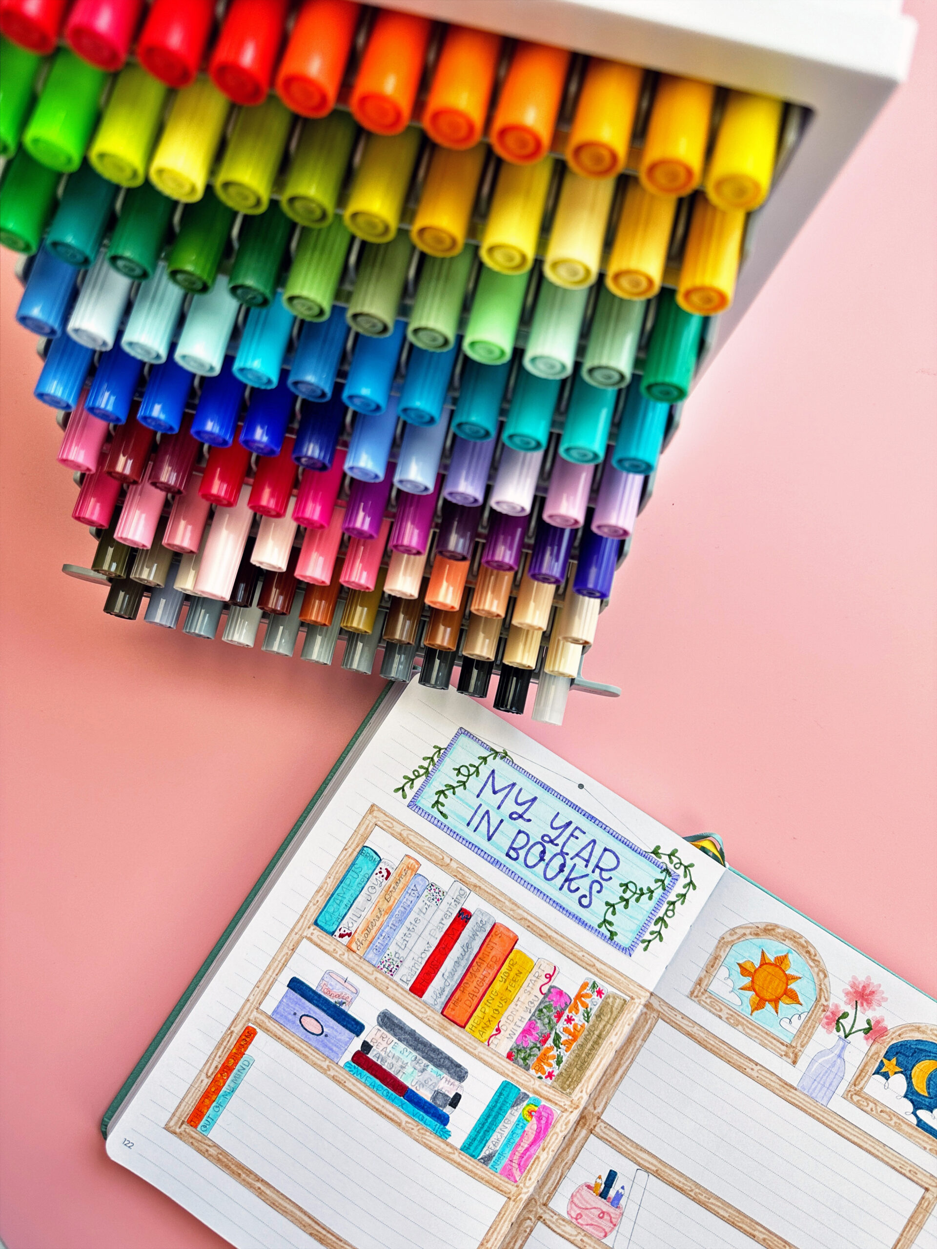 Draw a bookshelf to document the books you've read this year. To color the books use the Tombow Dual Brush Pens. #tombow #readingjournal