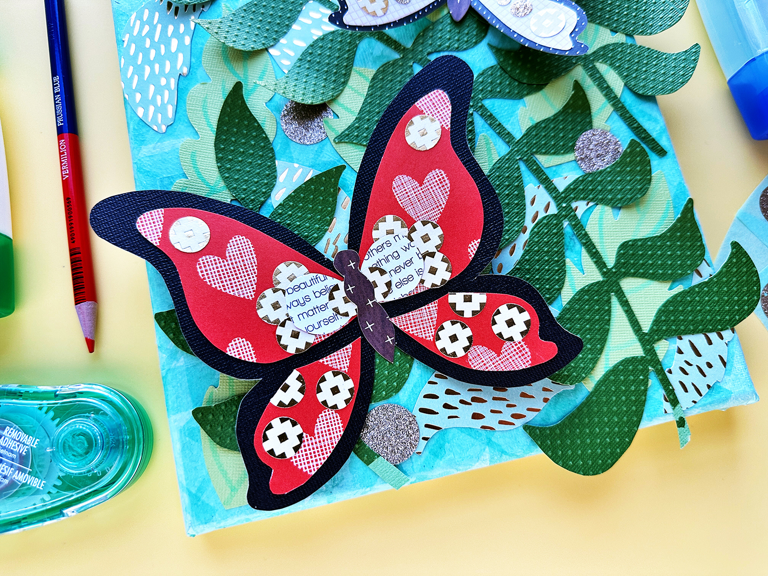 Paint with scissors and glue! Create a nature canvas using cardstock, patterned paper, and Tombow Adhesives. #tombow #mixedmedia