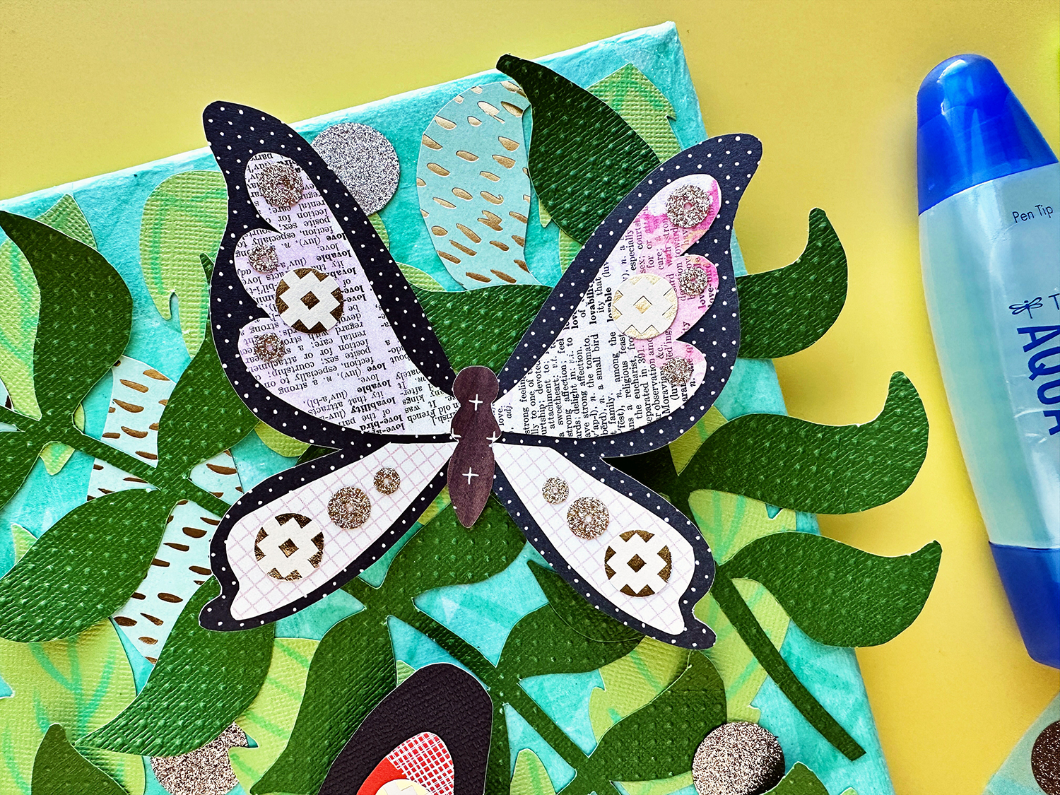 Paint with scissors and glue! Create a nature canvas using cardstock, patterned paper, and Tombow Adhesives. #tombow #mixedmedia