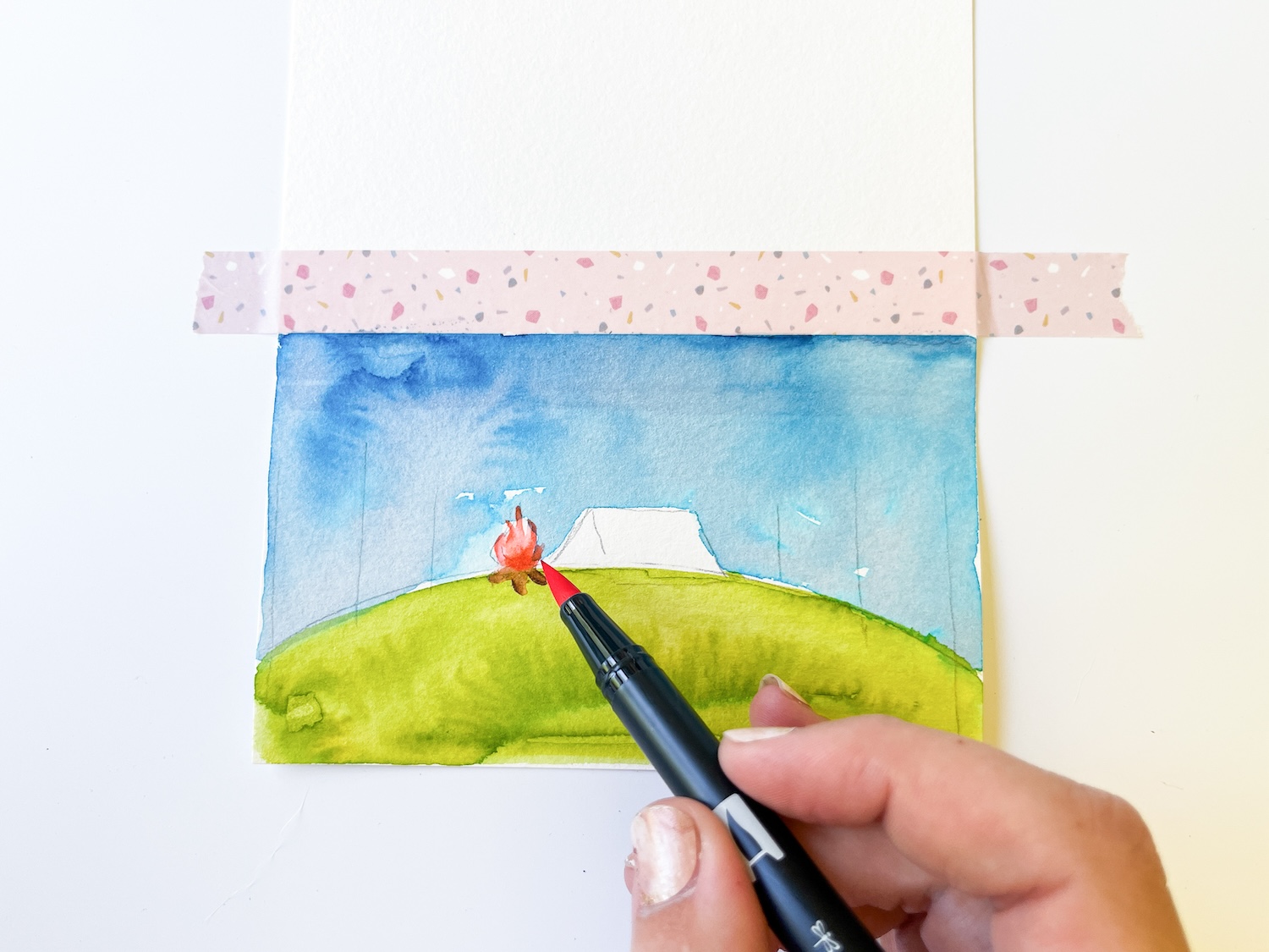 Use Dual Brush Pen 905 to color in the campfire