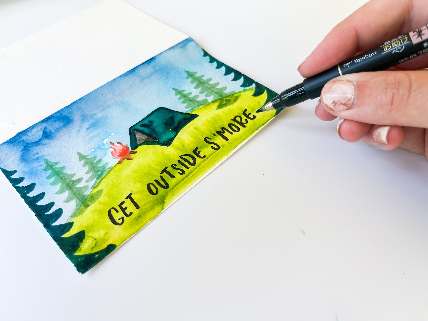 Use a @tombowusa fudenosuke brush pen to letter on "get outside s'more"