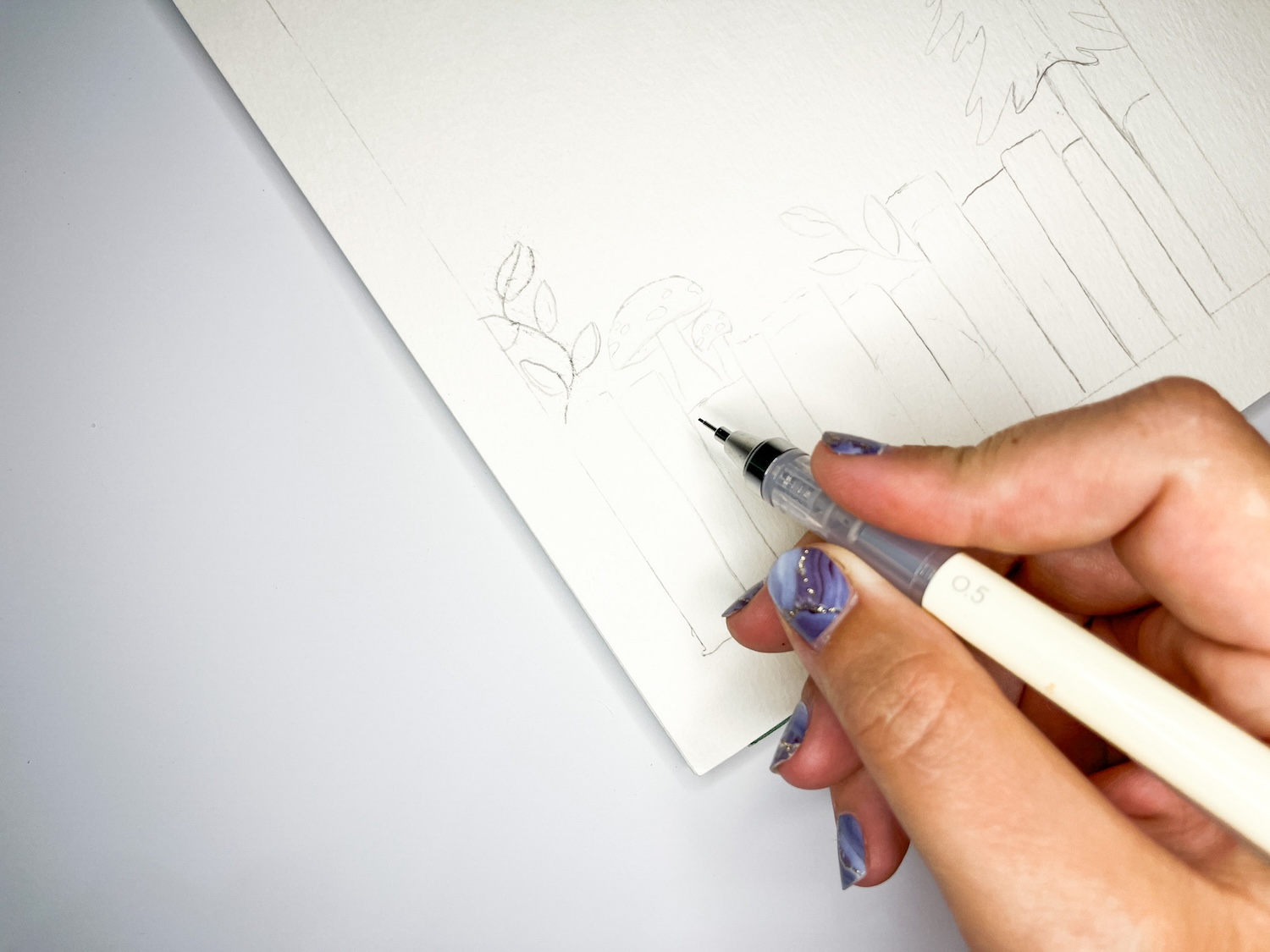 Learn how to make a DIY Notepad with a cute book theme using Tombow Dual Brush Pens and MONO Aqua Liquid Glue! Step one: sketch out your design