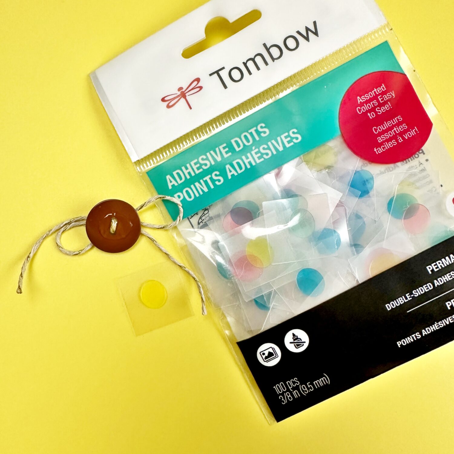 Use Tombow Adhesive Dots to glue bulky embellishments like buttons. #tombow #crafts