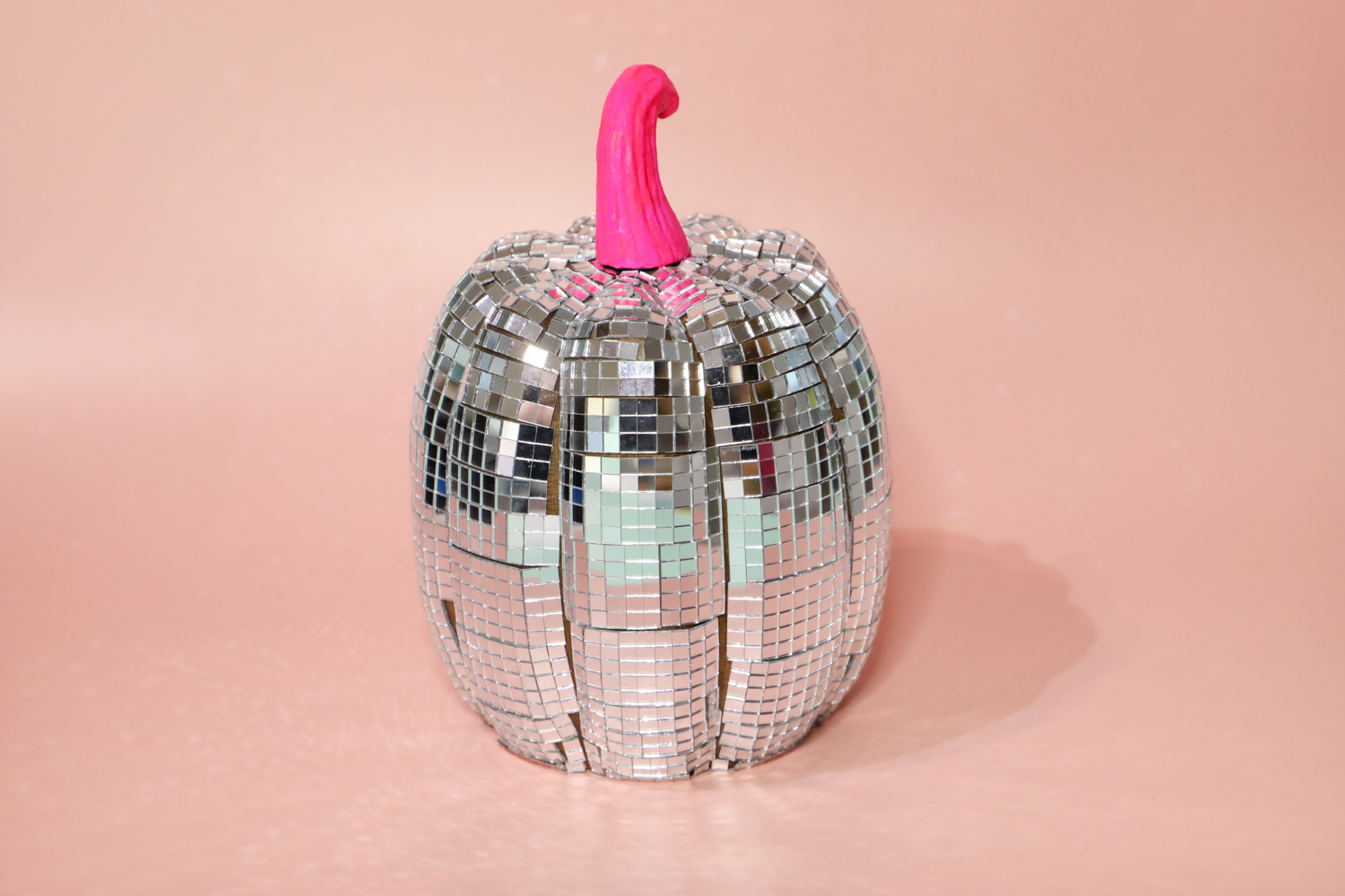 DIY Disco Ball Pumpkin with a neon pink stem! Halloween, but make it disco! @tombowusa