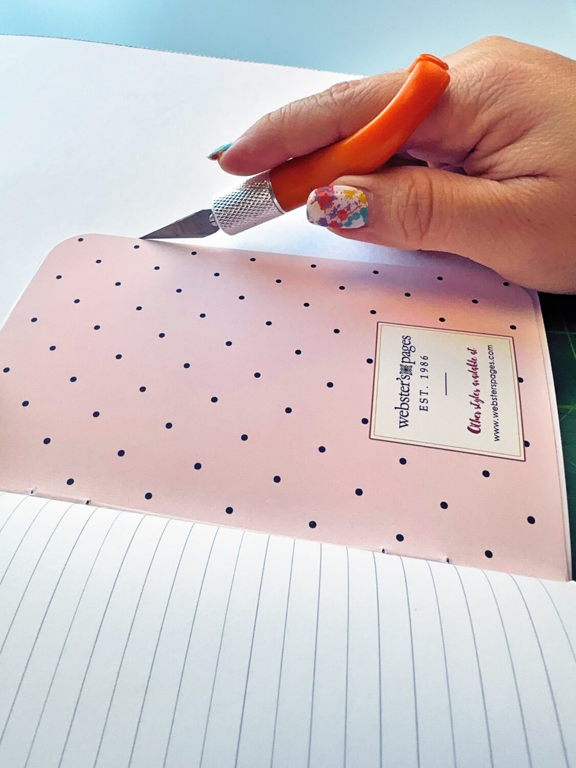 Before cutting, close to your notebook to allow the paper to stretch enough. You can use scissors or a craft knife to cut around the notebook. #tombow #papercraft