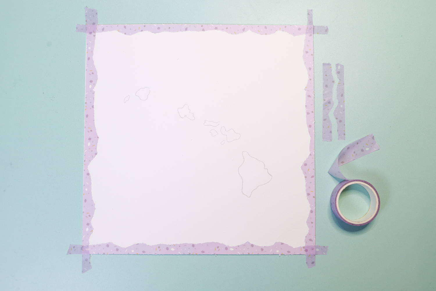 Torn washi tape on watercolor paper to create a map effect