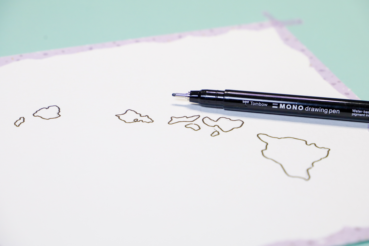 @tombowusa MONO Drawing Pen 08 laying on watercolor paper, with an illustration of the Hawaiian Islands Map