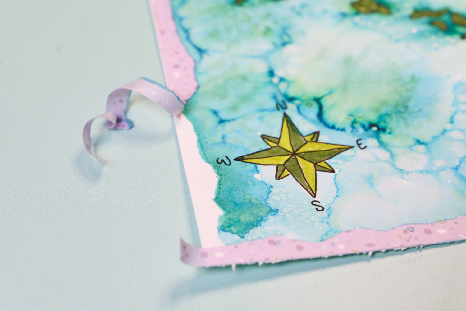 Torn Washi Tape peeling away to reveal the diy map torn edge design