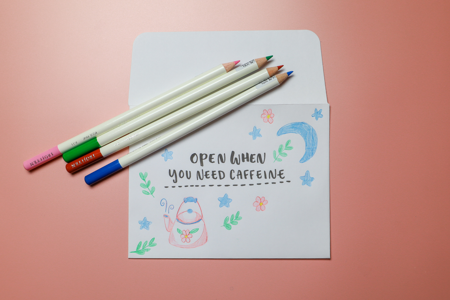 Tombow Irojiten Colors Pencils laying on open when letters, creating cute doodles