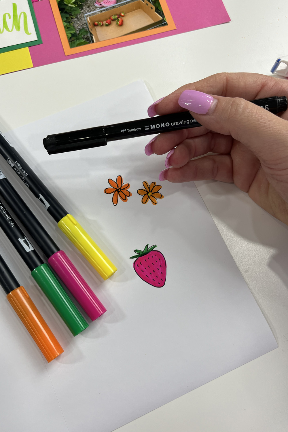 mono drawing pen used to make strawberry and flower stickers