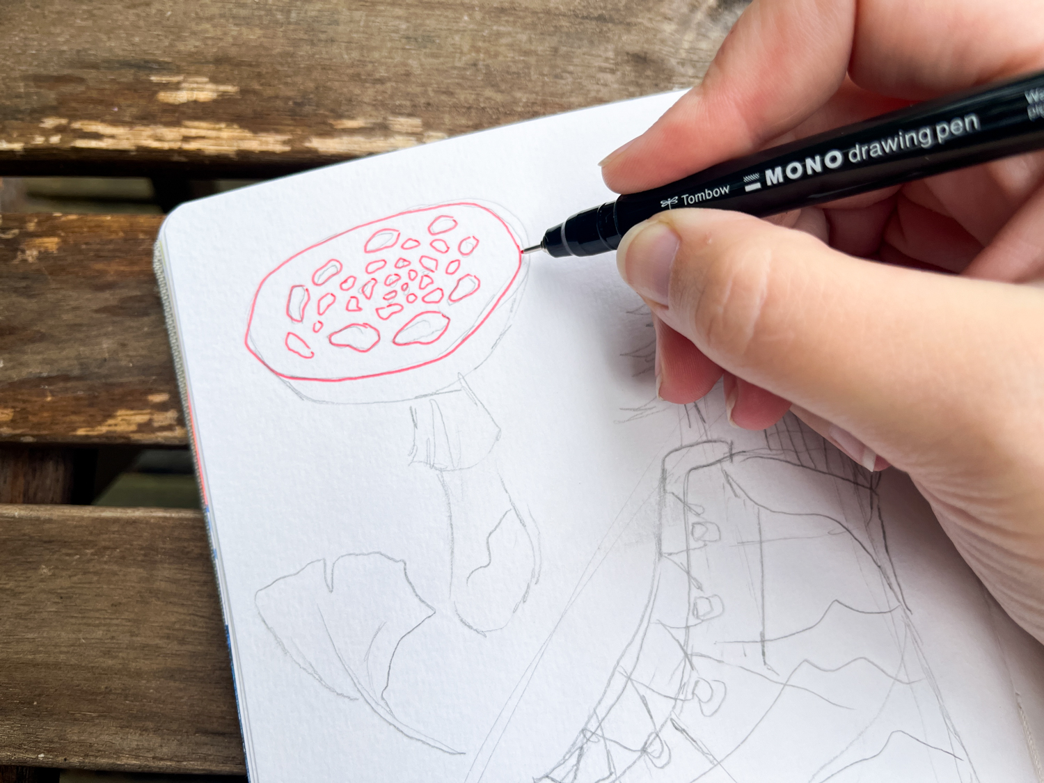 @studio.katie drawing a mushroom using a @tombowusa MONO Drawing Pen in Red