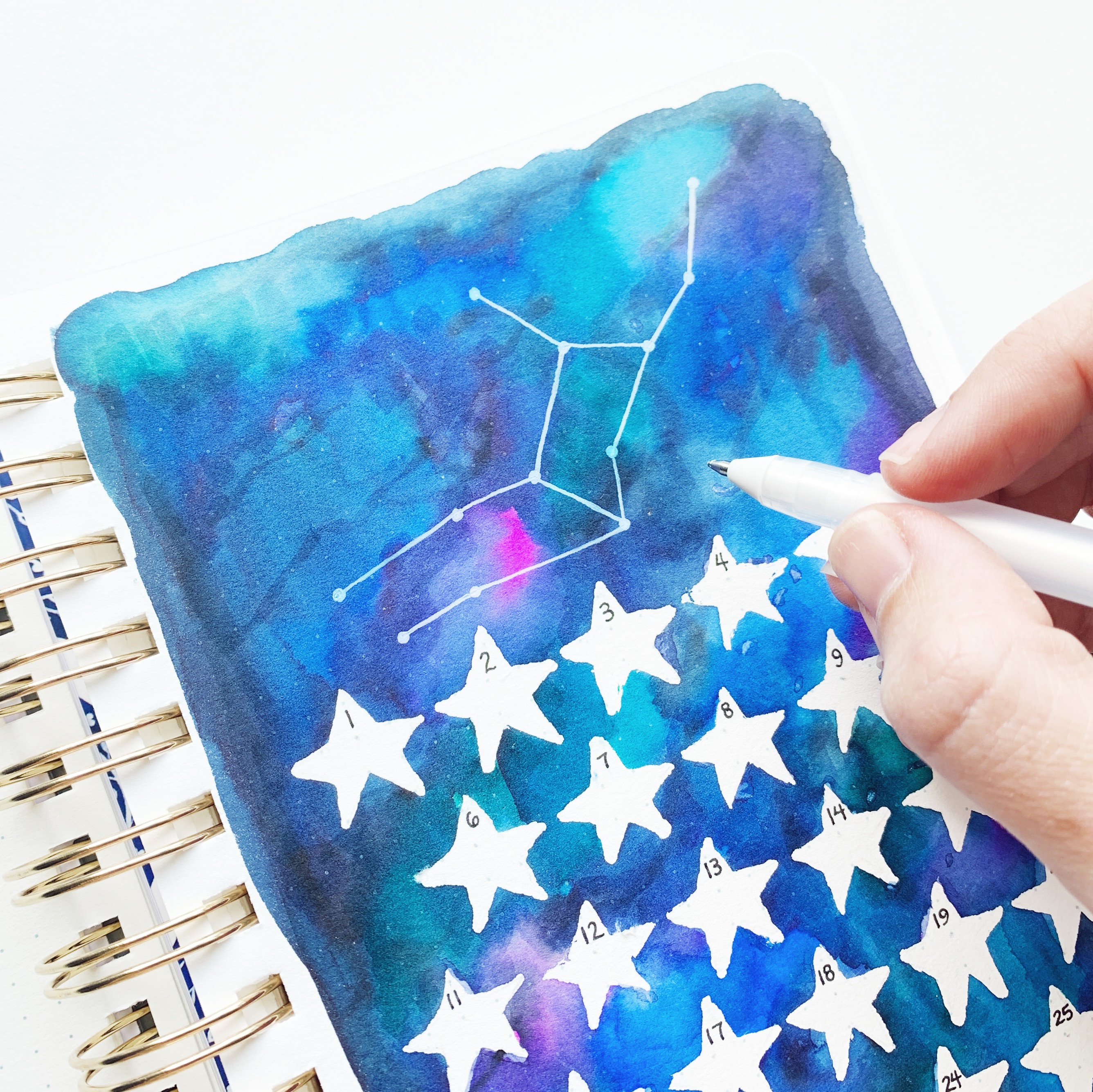 Learn how to make a horoscope watercolor habit tracker with Adrienne from @studio80design!