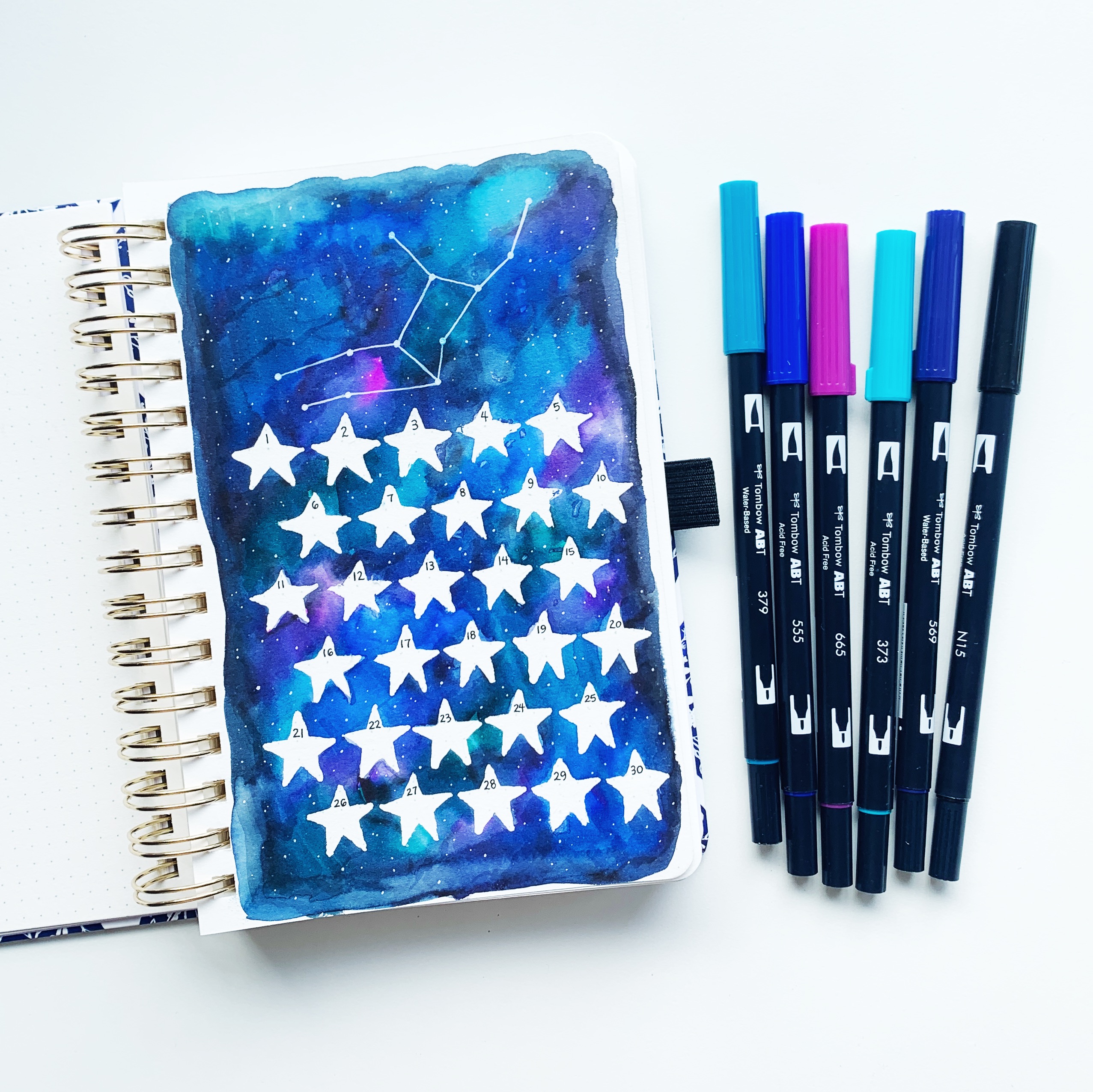 Learn how to make a horoscope watercolor habit tracker with Adrienne from @studio80design!