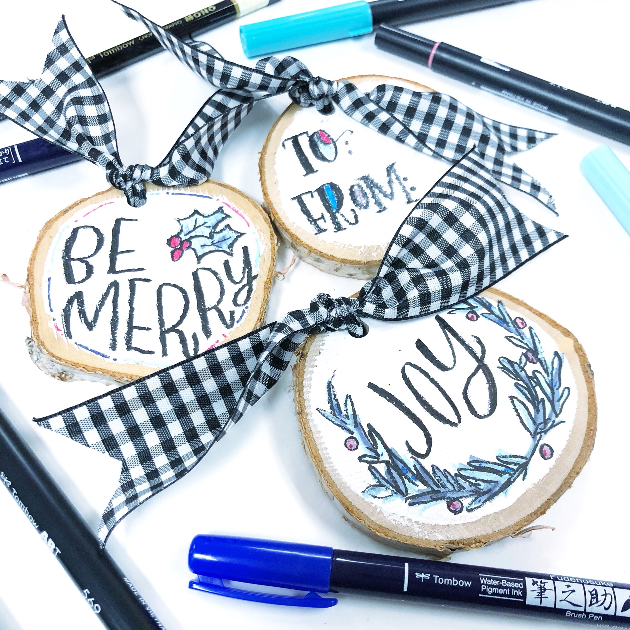 Lauren Fitzmaurice of Renmade Calligraphy shows you step by step how to create your own handlettered wood slice tags and ornaments using a few of her favorite Tombow USA supplies.