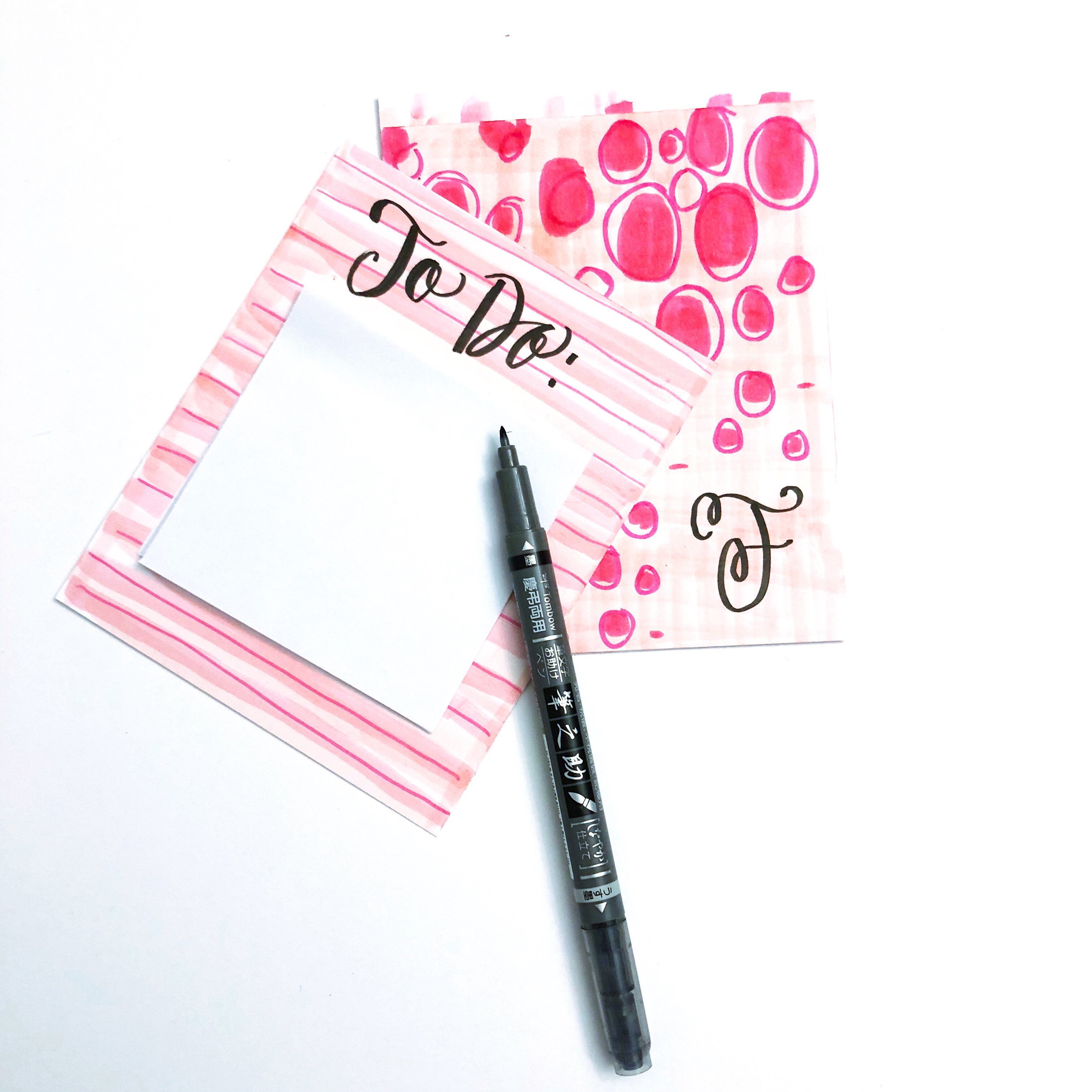 Lauren Fitzmaurice of @renmadecalligraphy shows you step by step how to create your own DIY Pink Patterned Sticky Note Pads! Create this fun project with goodies from TombowUSA.com.