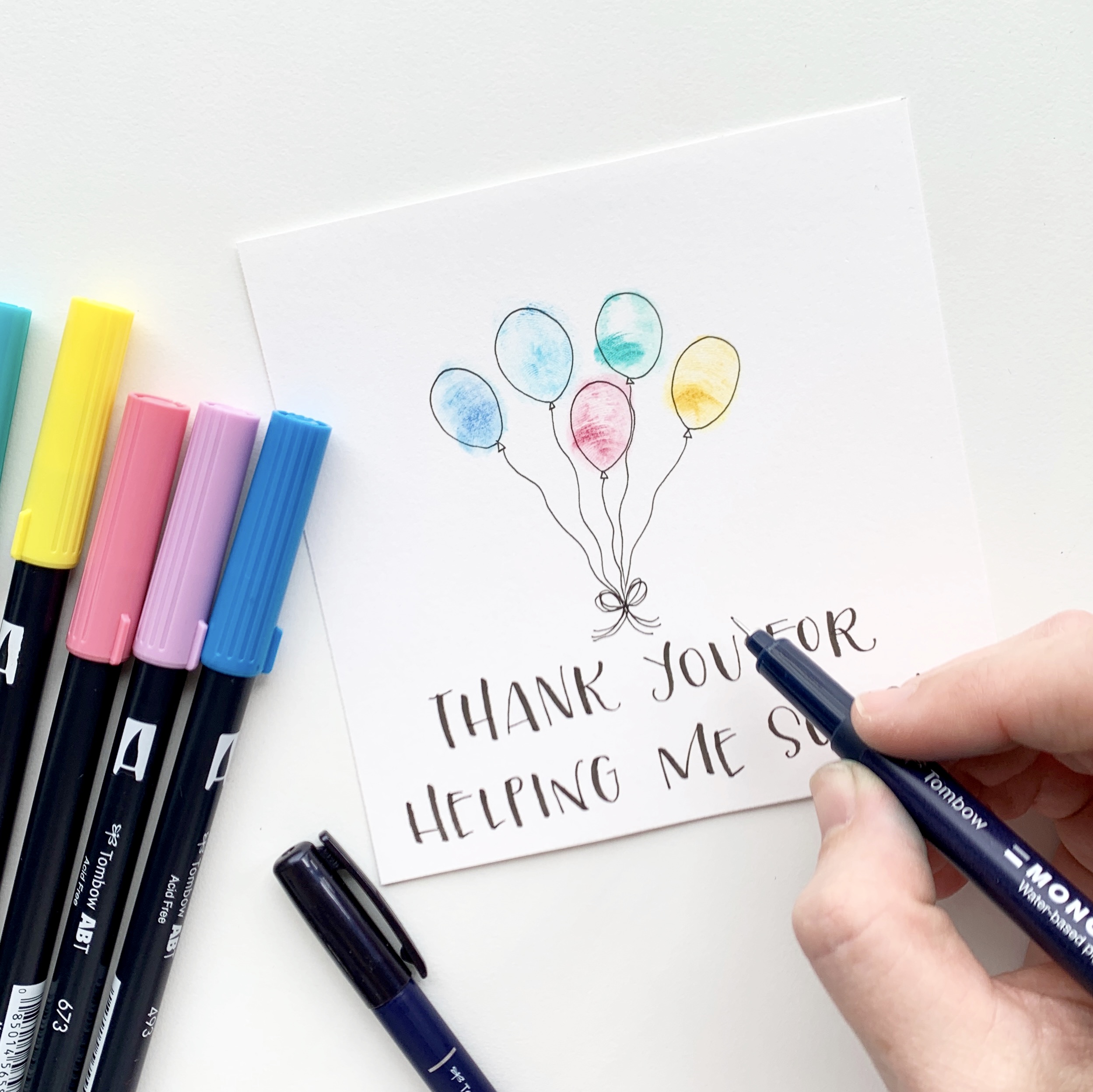 Learn how to make a thumb print balloon card for teacher appreciation week with Adrienne from @studio80design!
