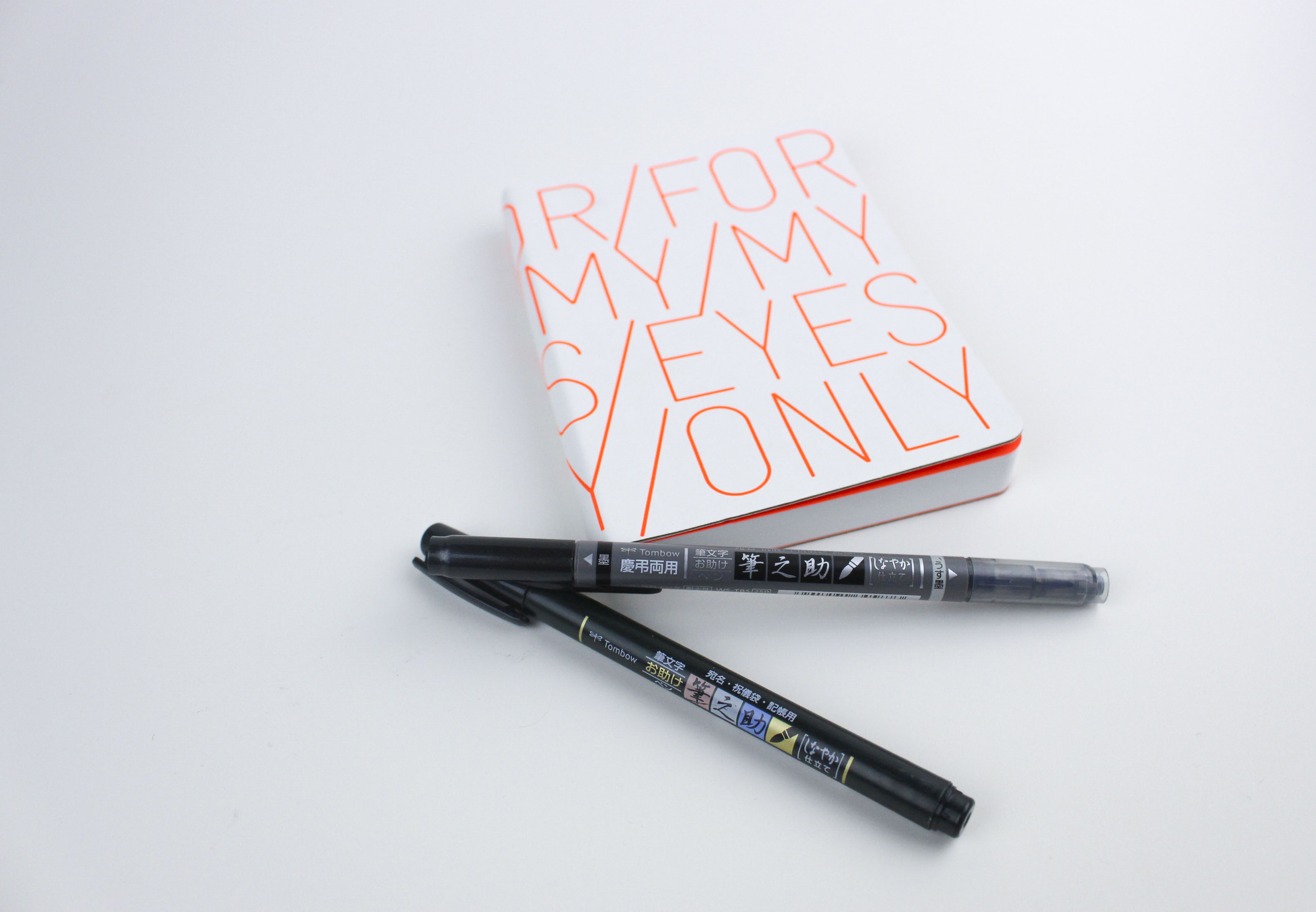 Tombow Brush Pen Testing in 8 Different Bullet Journals – All About Planners