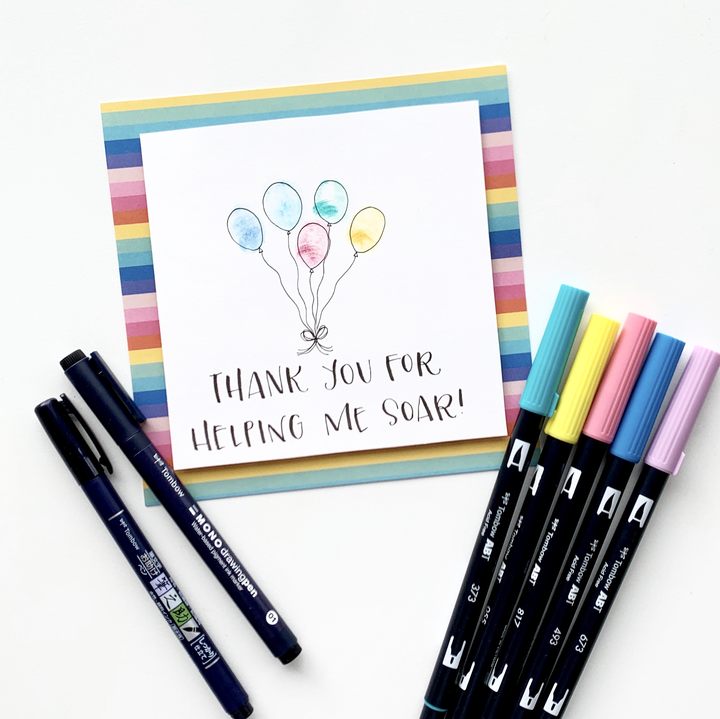 Learn how to make a thumb print balloon card for teacher appreciation week with Adrienne from @studio80design!