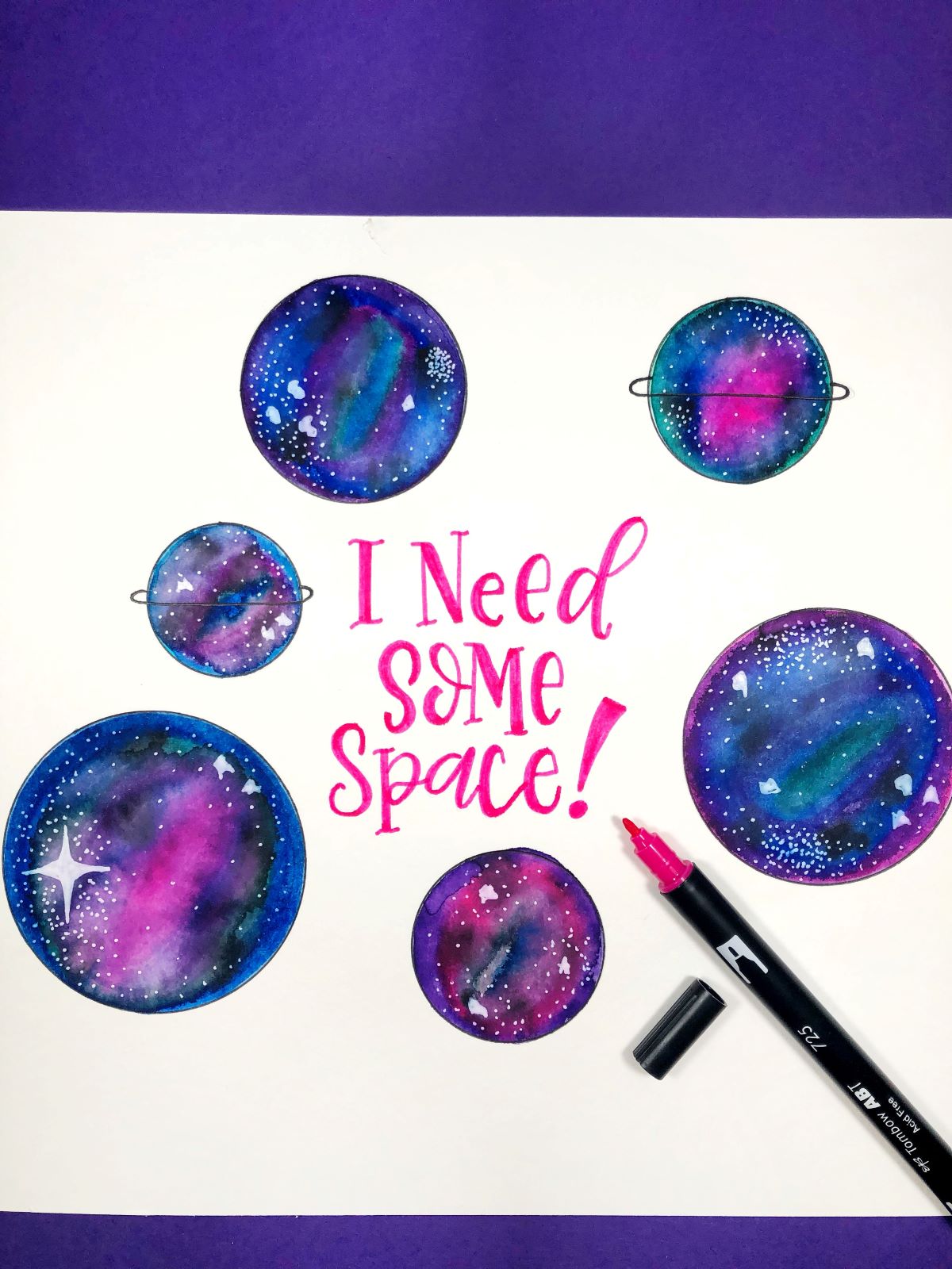 Watercolor a Space Print using Tombow's Dual Brush Pen Galaxy Set. Learn with @aheartenedcalling. #tombow #watercolor