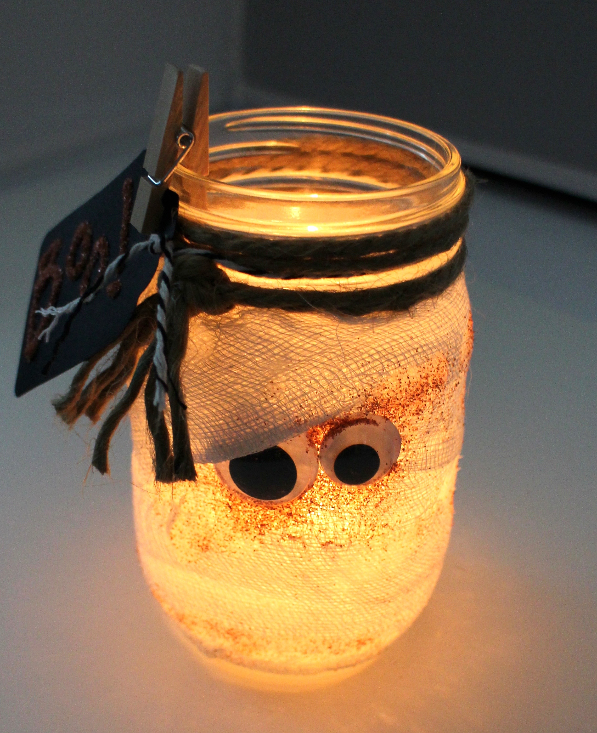 DIY Mummified Mason Jar | Create this quick and easy Halloween decor project with a step by step tutorial from Tombow!