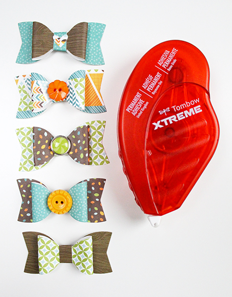 Use your dies, buttons and the Tombow Xtreme Adhesive to make your own paper bows! #tombow #paperbows