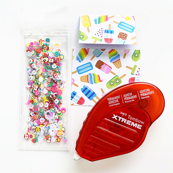 The Tombow Xtreme Adhesive is perfect for unusual surfaces like the plastic of this shaker bookmark. #tombow #bookmark