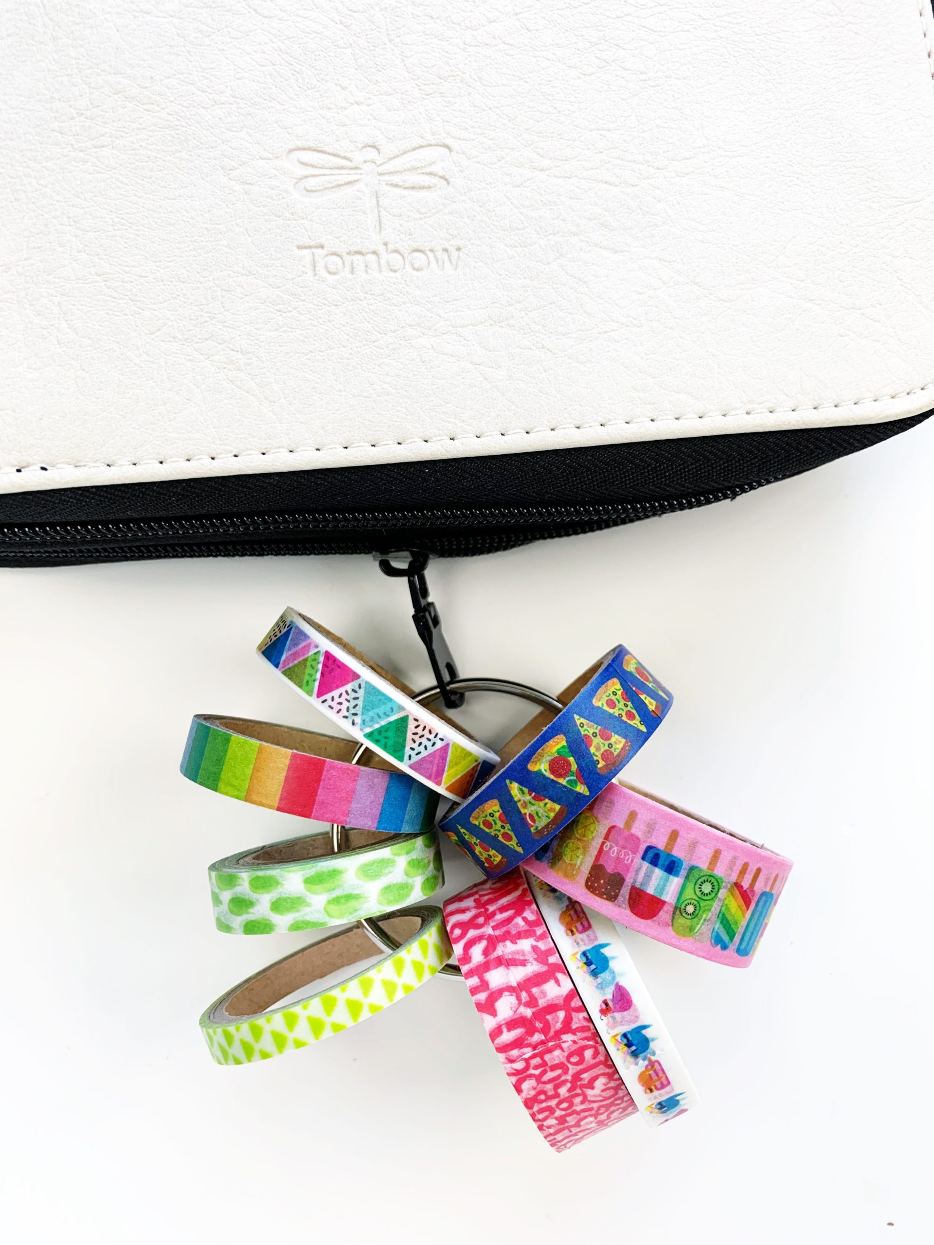 Use the zipper of the Tombow Zippered Marker Storage to add a ring with washi tape. #tombow #washitape