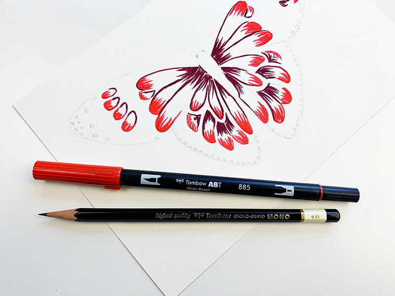 Use the Tombow MONO Drawing Pencil 4H to draw a simple butterfly. Add color with the Tombow Dual Brush Pens. #tombow