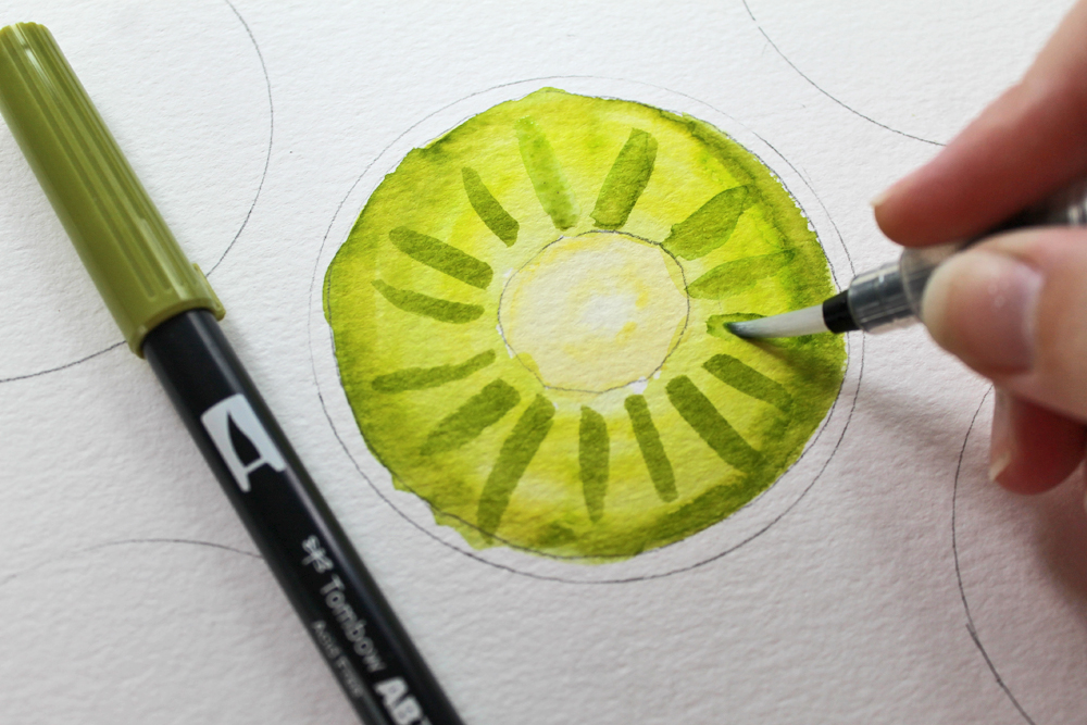 Learn how to paint a watercolor kiwi art piece using @tombowusa Dual Brush Pens and this tutorial by @studiokatie #tombowusa #watercolor