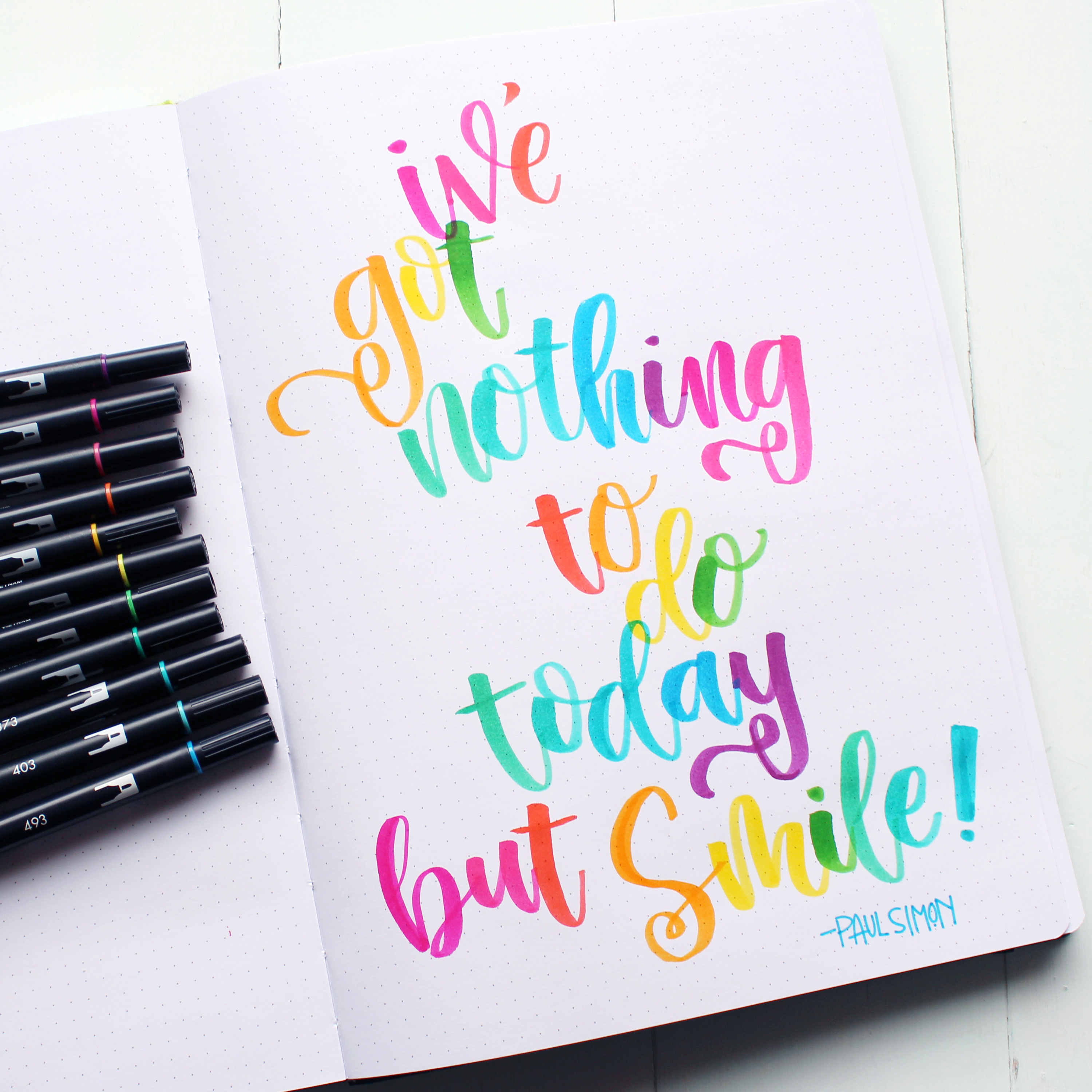 I've got nothing to do today but smile! --Paul Simon. This is the perfect quote for Rainbow Lettering in Tombow Dual Brush Pens on the dotted pages of a Passion Planner.