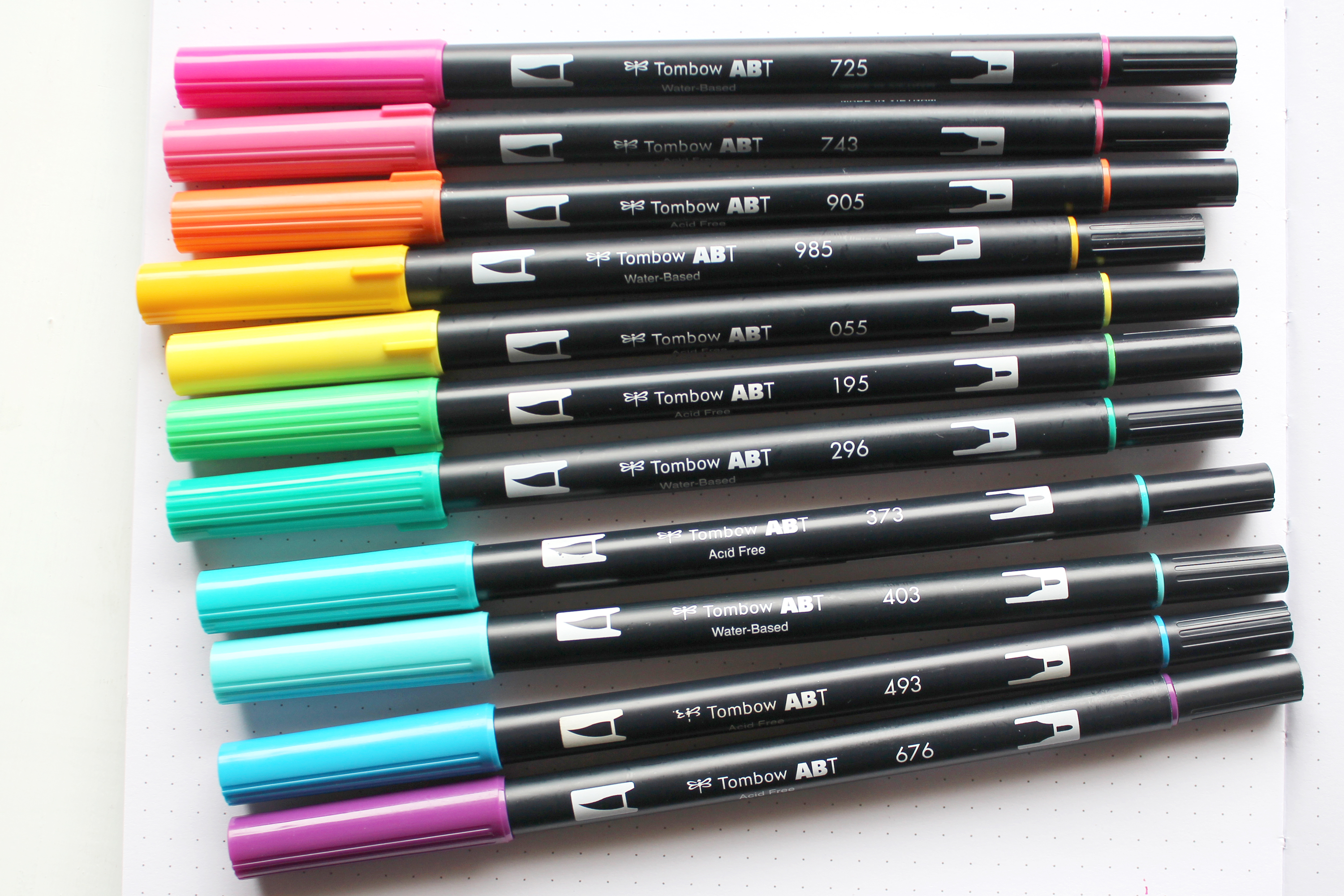 Tombow Dual Brush Pens in bright rainbow color order.
