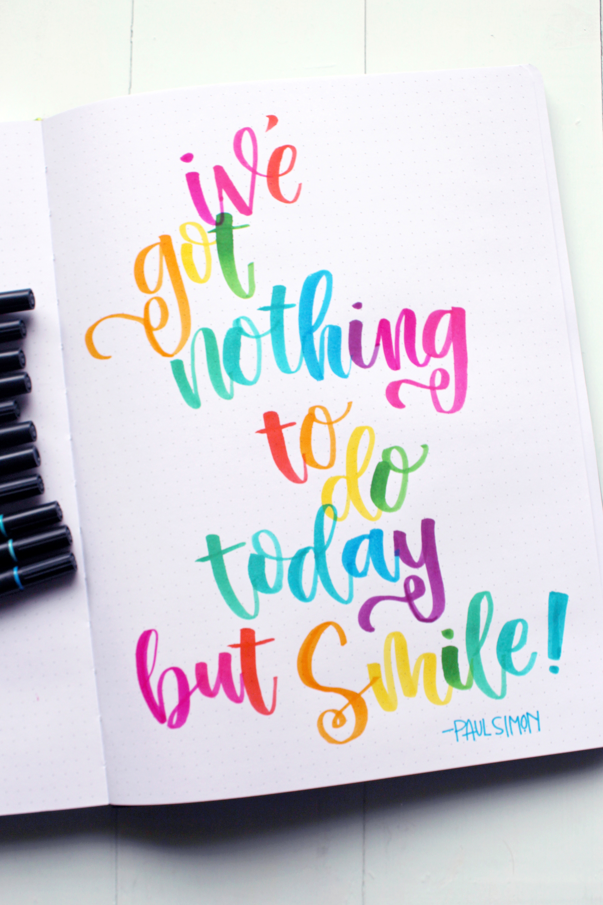 I've got nothing to do today but smile! --Paul Simon. This is the perfect quote for Rainbow Lettering in Tombow Dual Brush Pens on the dotted pages of a Passion Planner.