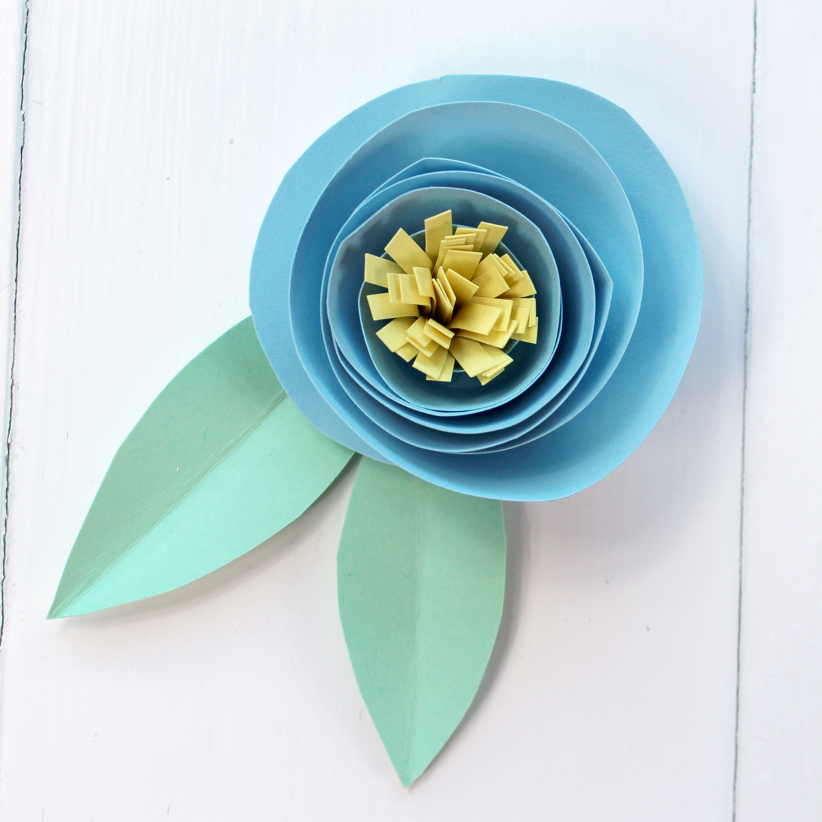 Rolled paper flowers for Spring Banner