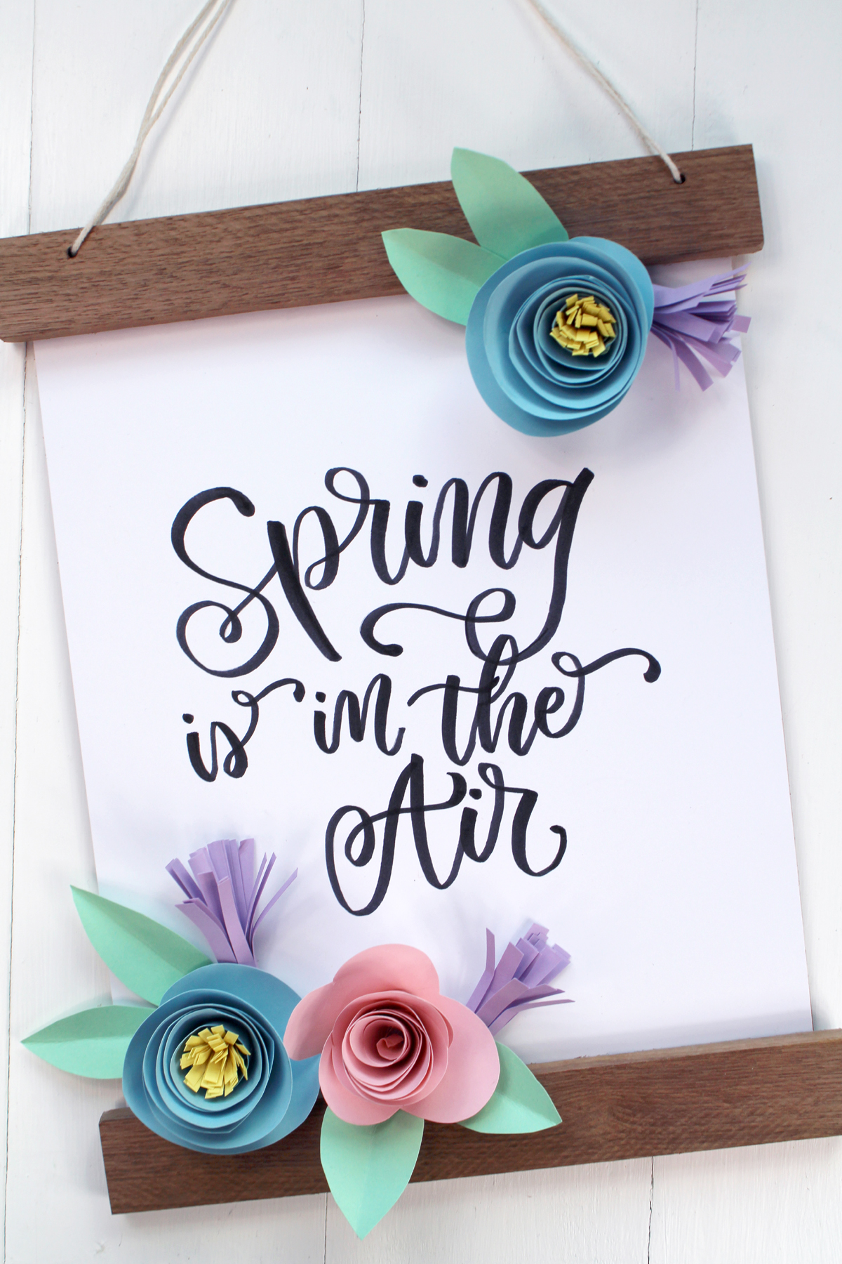 Spring is in the air Banner made with rolled paper flowers and Tombow Adhesives