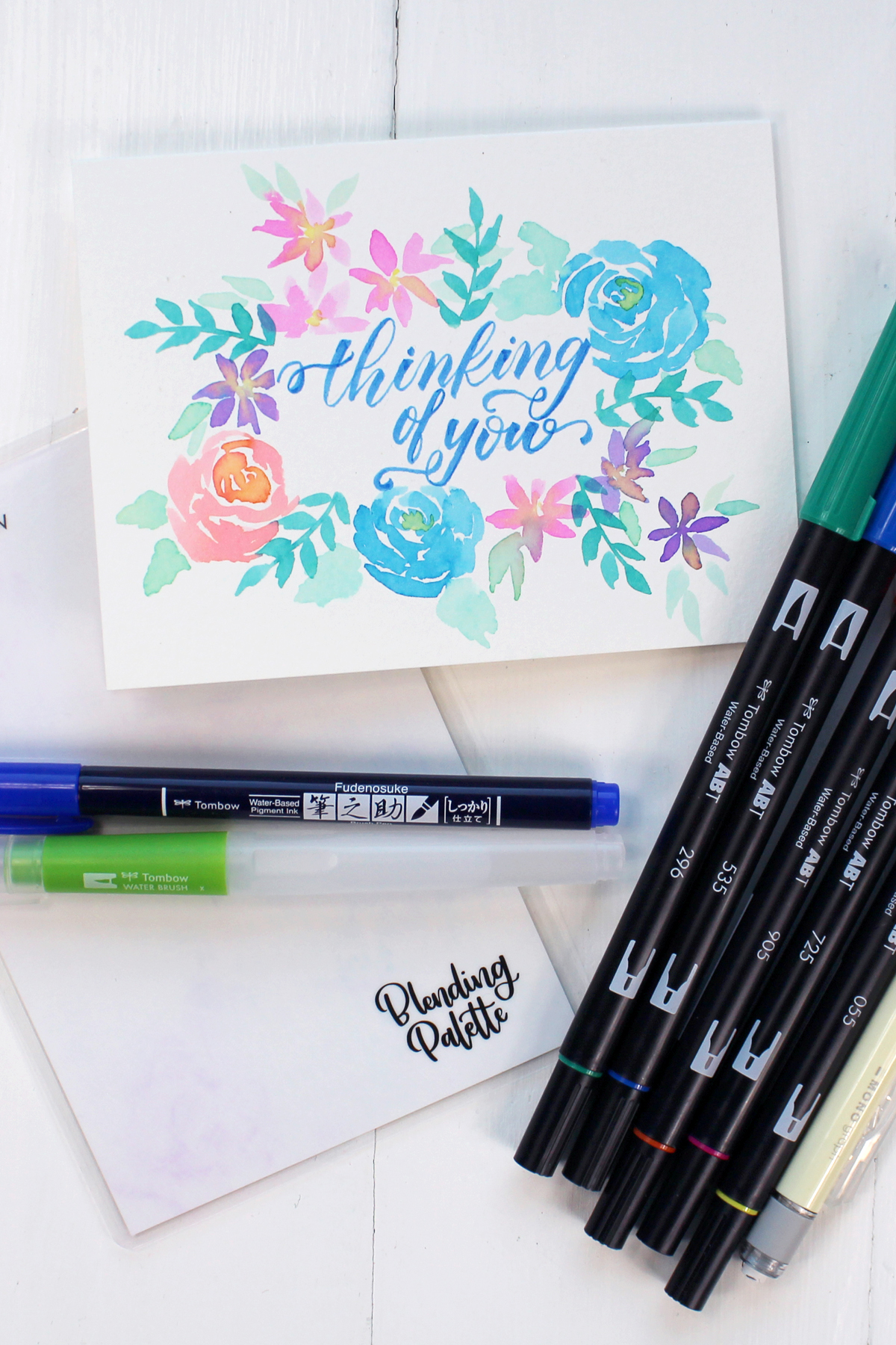 How to paint loose watercolor florals on a watercolor paper greeting card.