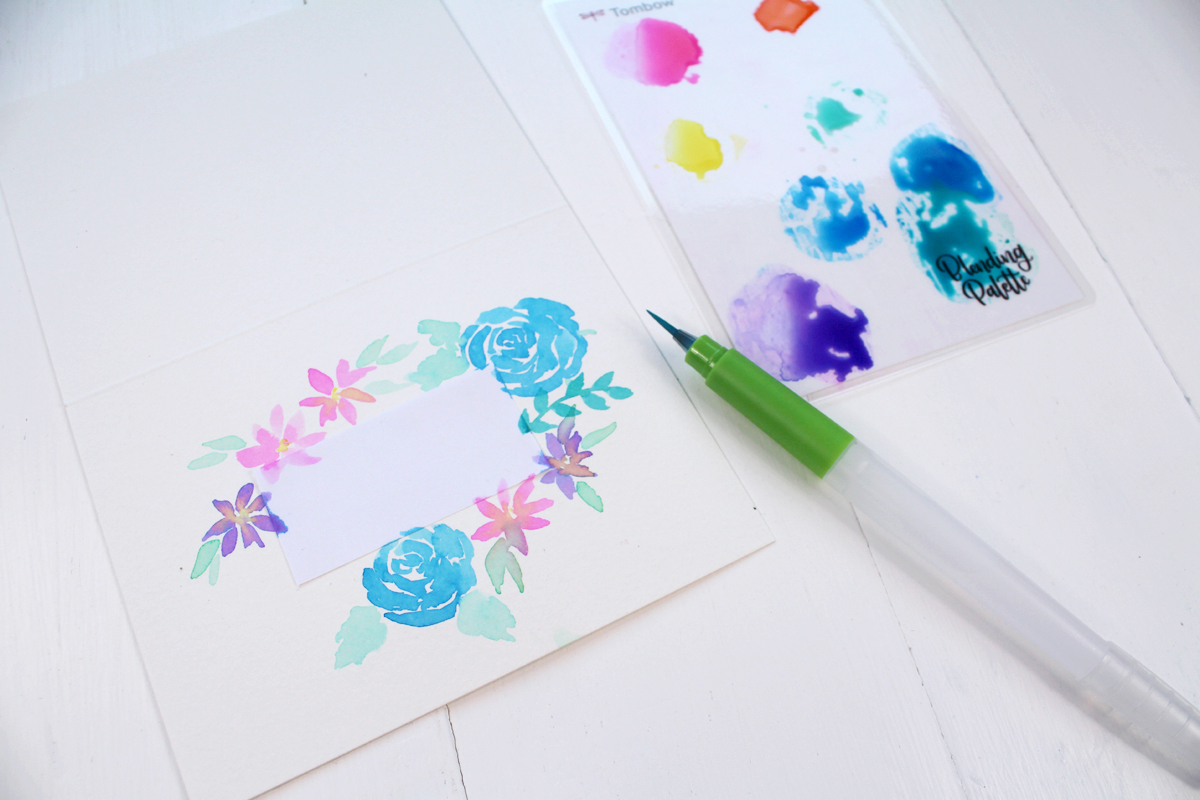 How to paint watercolor flowers on a greeting card.