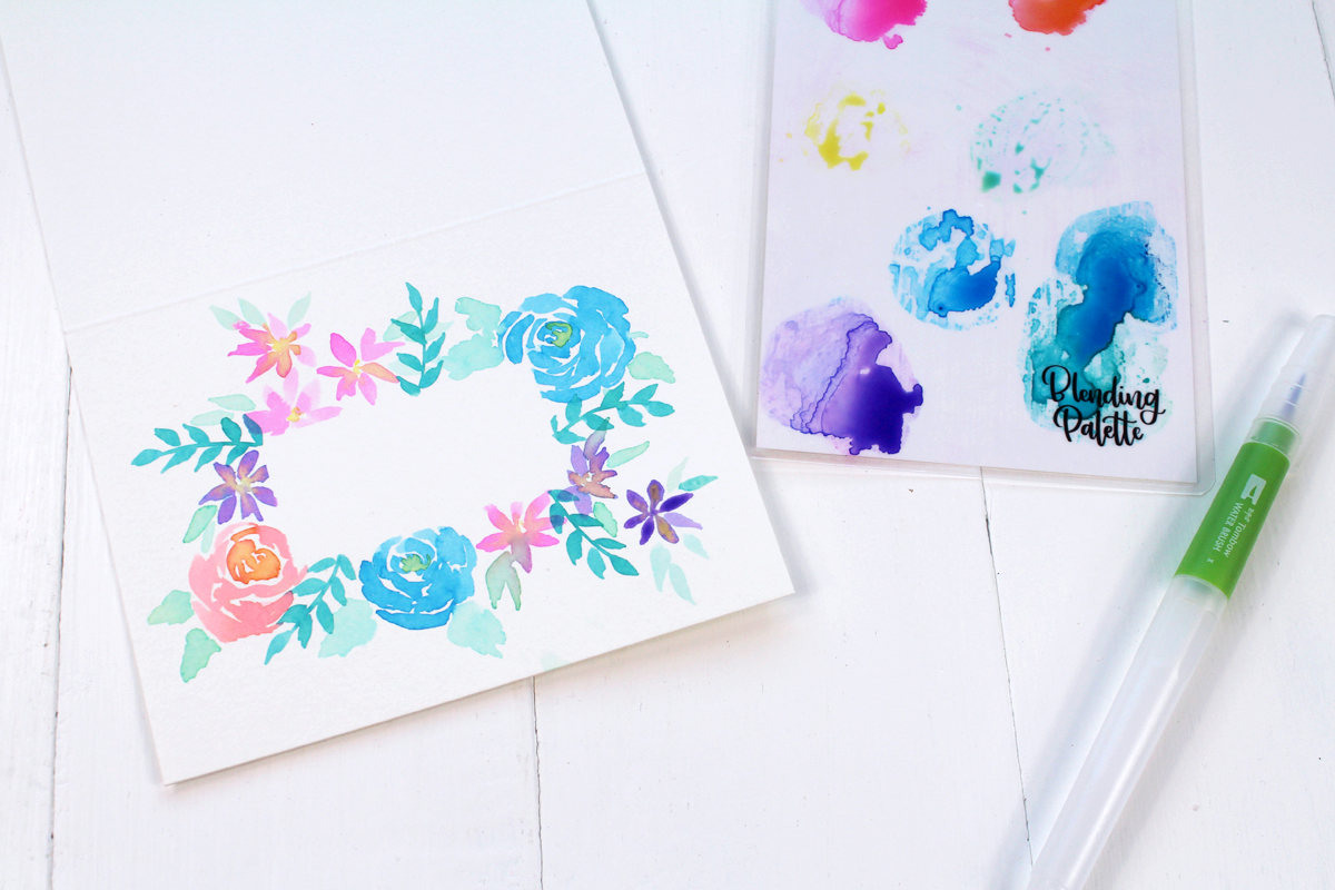 How to paint a watercolor flower frame for a greeting card.