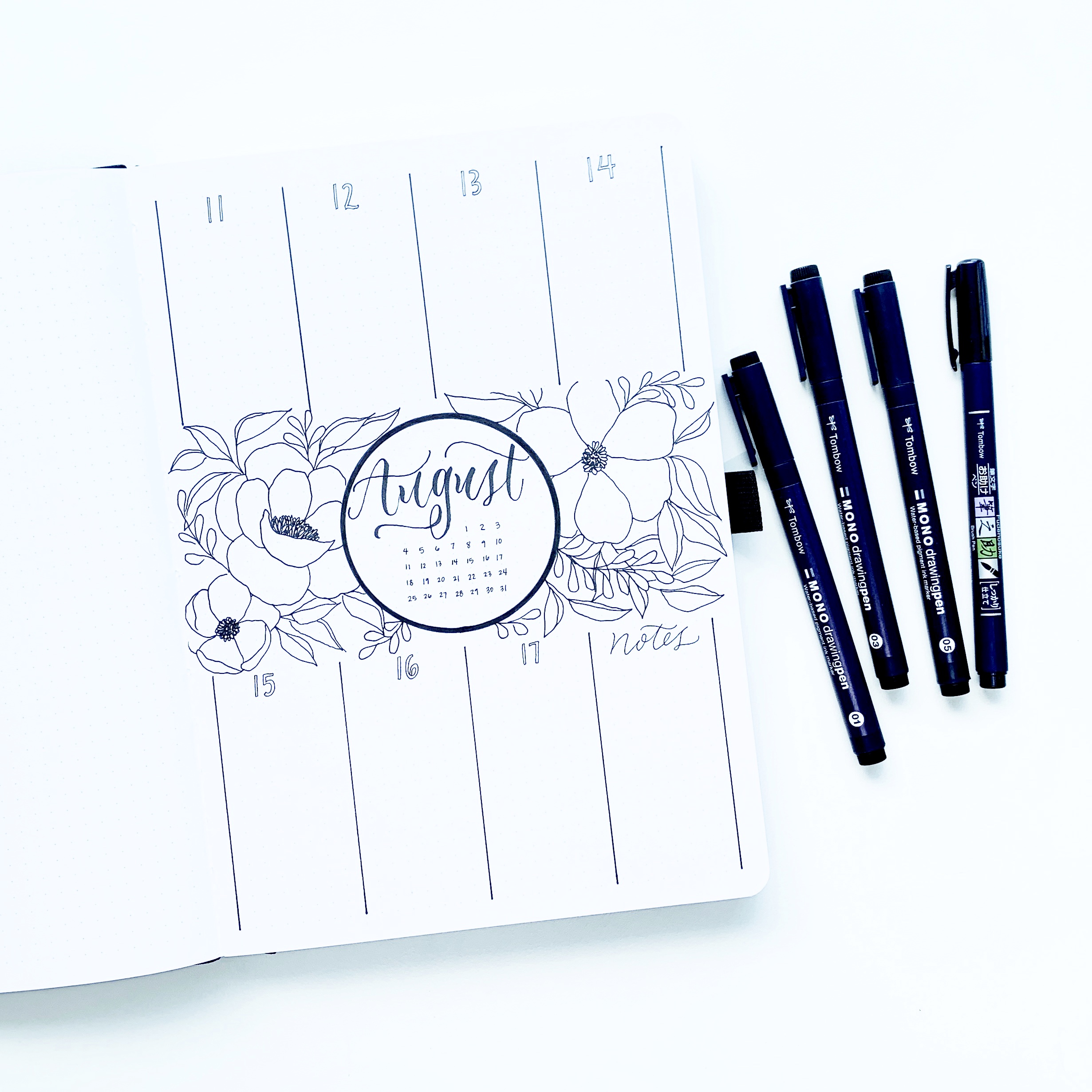 Weekly floral calendar bullet journal spread with Archer and Olive and Adrienne from @studio80design