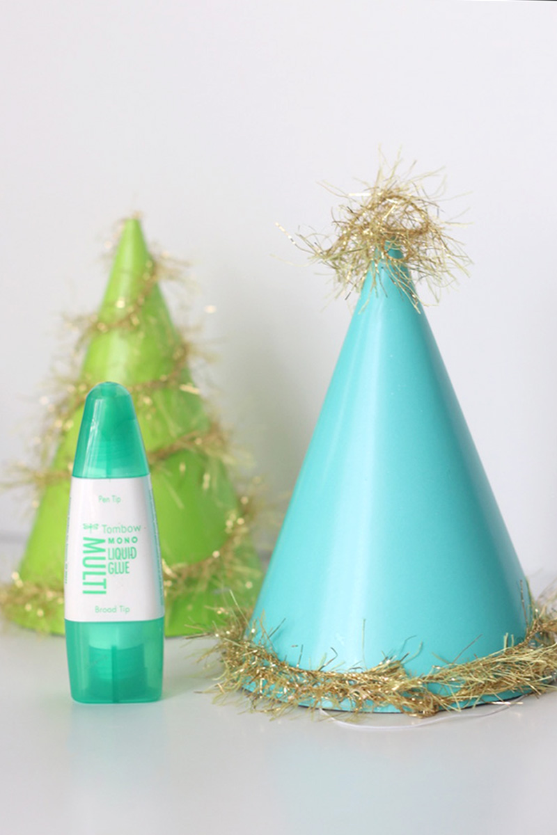 Use Tombow MONO liquid glue and make festive party hats for New Years Eve.