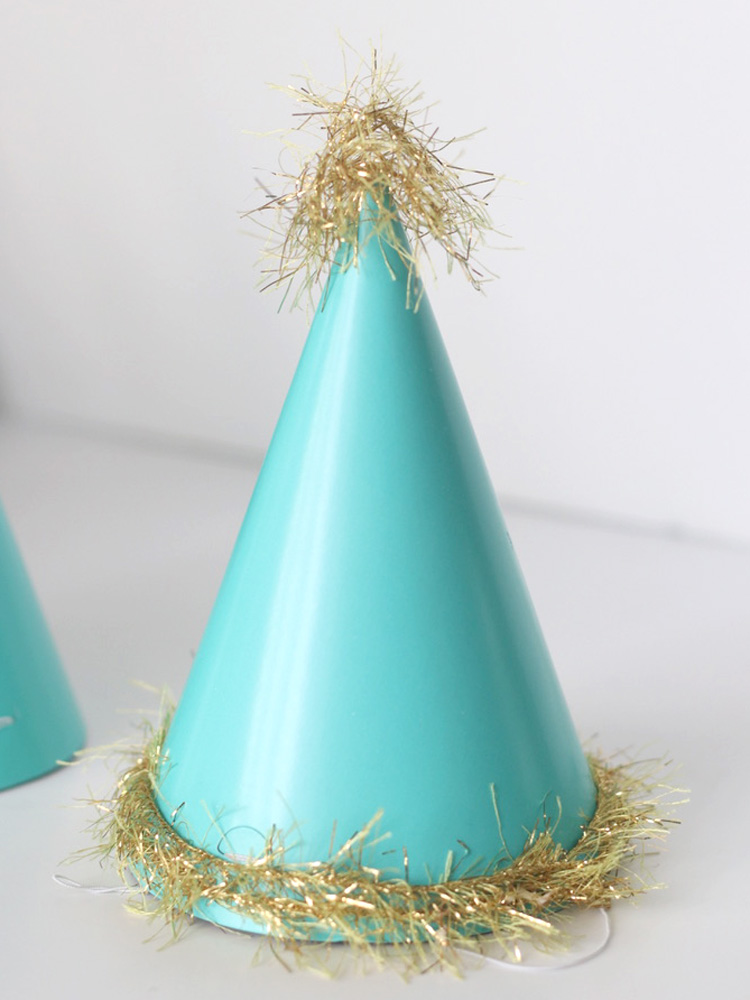 Use Tombow MONO liquid glue and make festive party hats for New Years Eve.