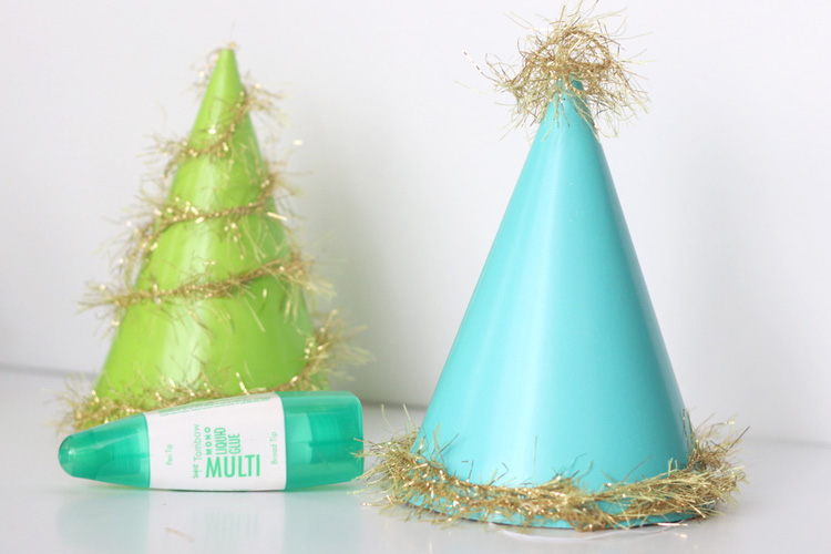 Use Tombow MONO liquid glue and make festive party hats for New Years Eve.