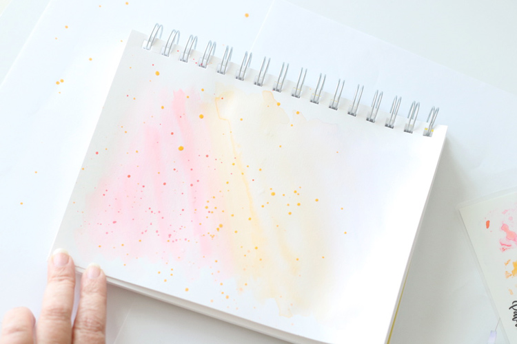 Use Tombow Dual Brush Pens as watercolors to create a watercolor splatter background for your hand lettering projects.